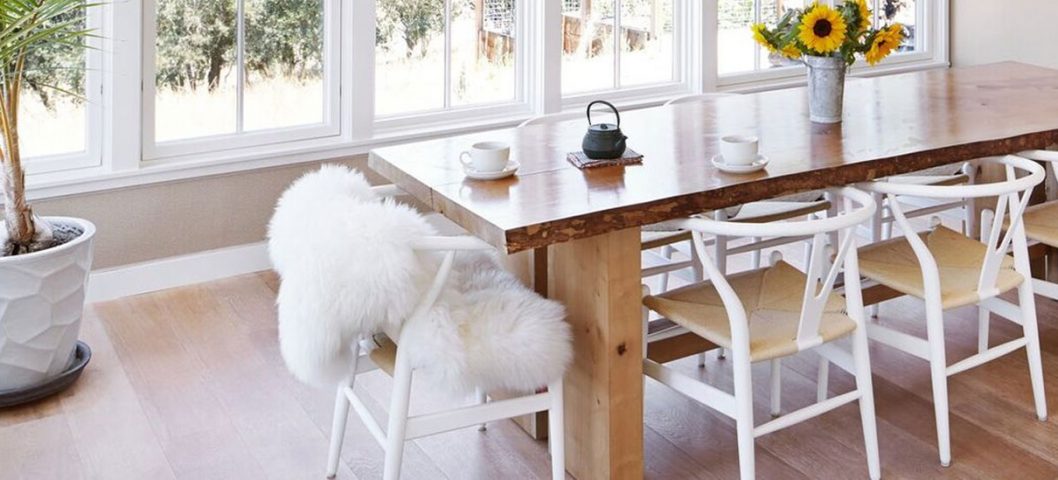 Big dining room with white chairs