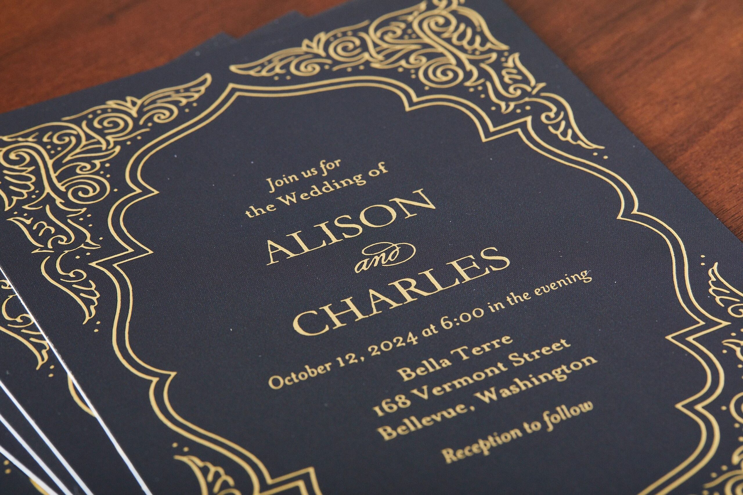 black and gold wedding invitation