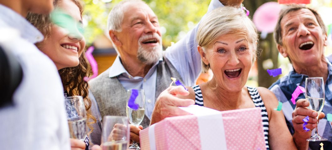 Family celebration outside in the backyard. Big garden party. Birthday party.