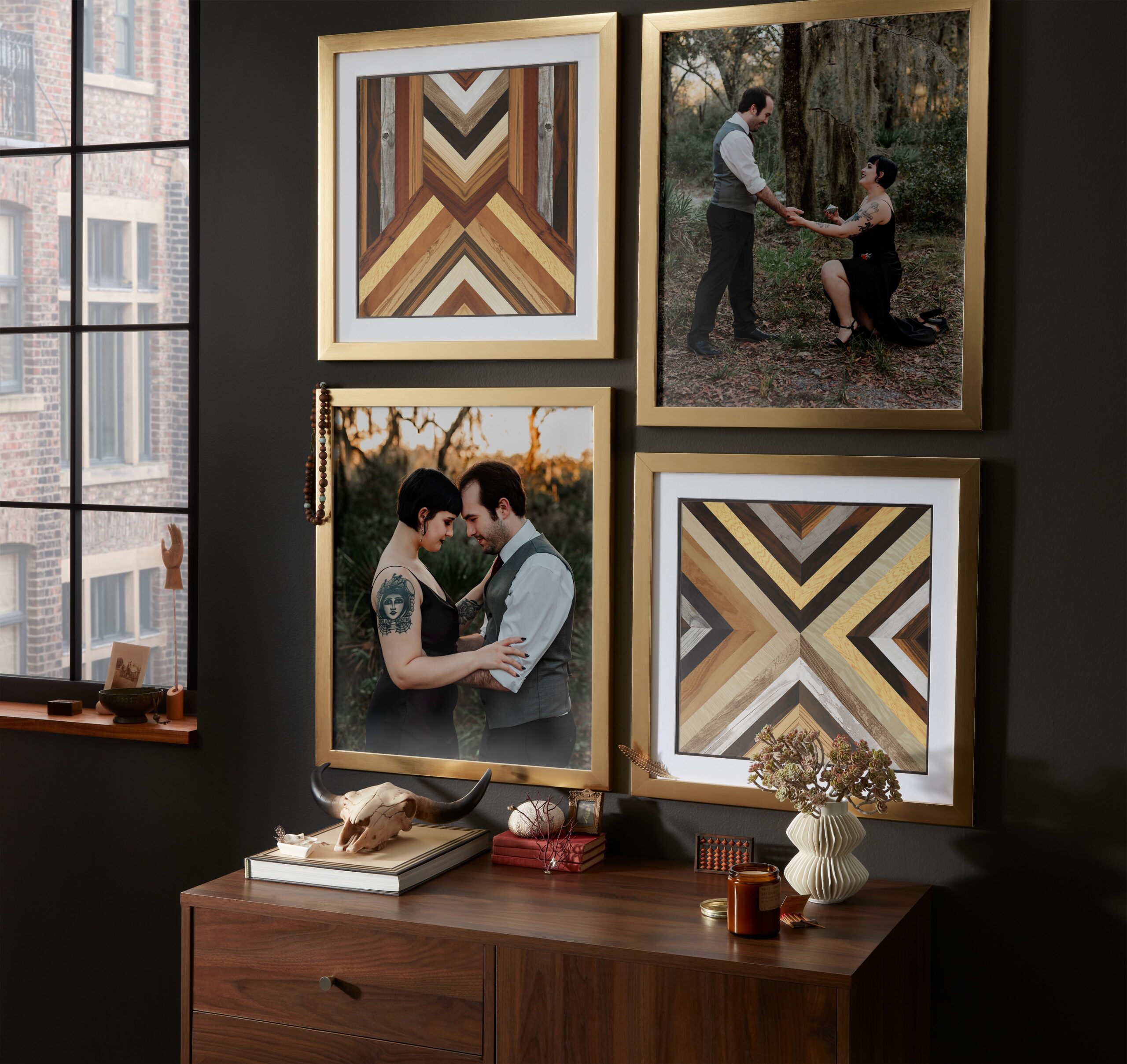 four pieces of wall art hanging