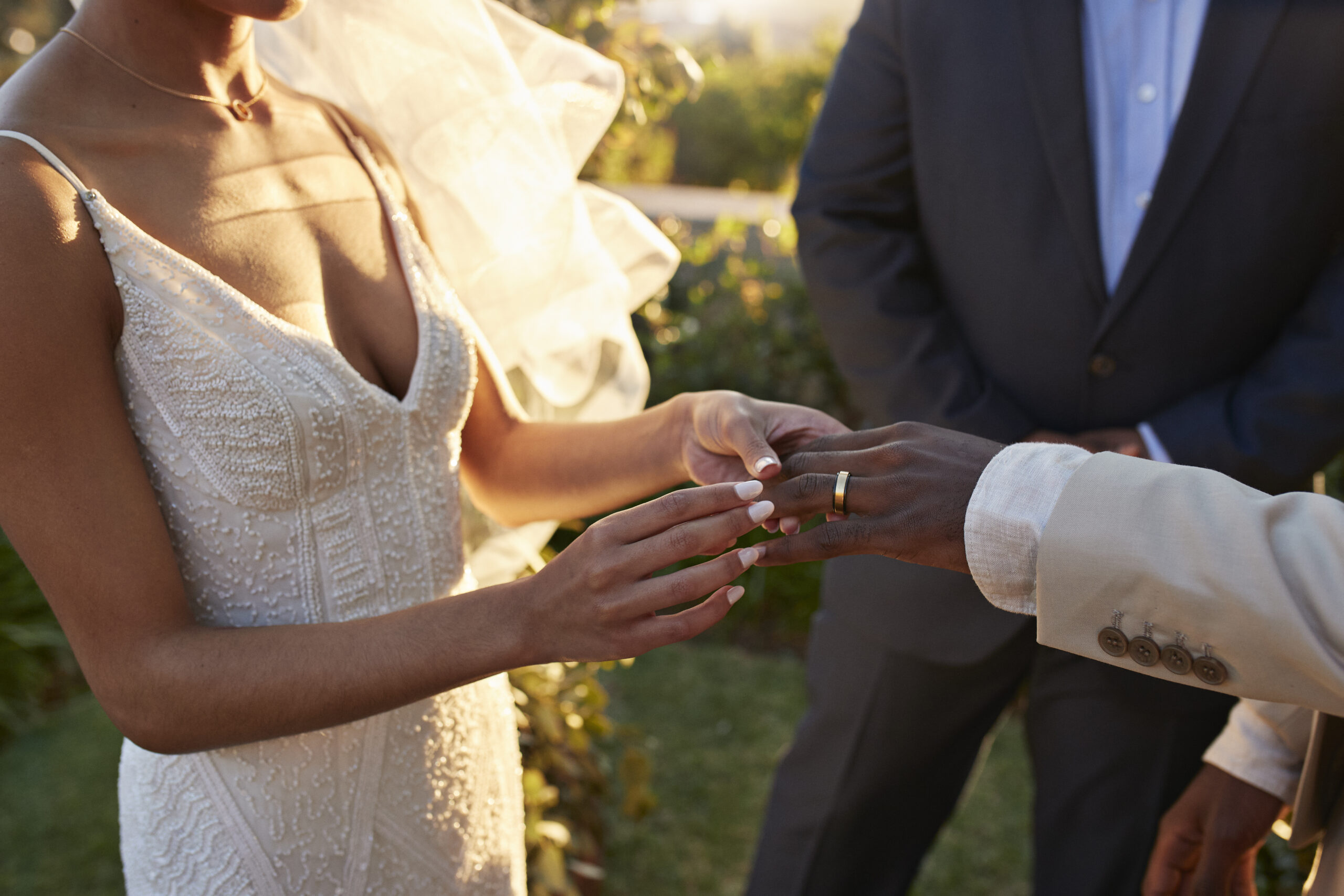 bride and groom exchanging rings