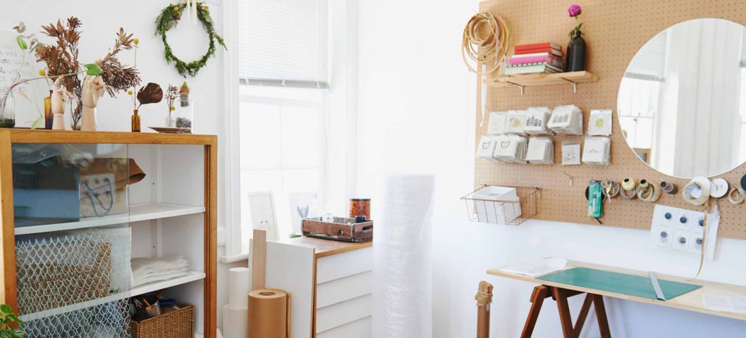 Craft room with bulletin board.