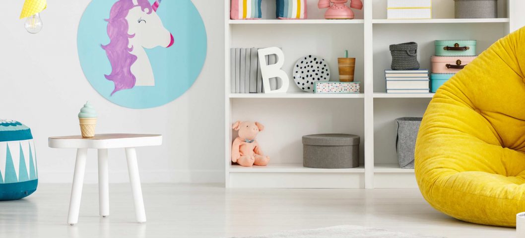 Kid room shelves and yellow chair.