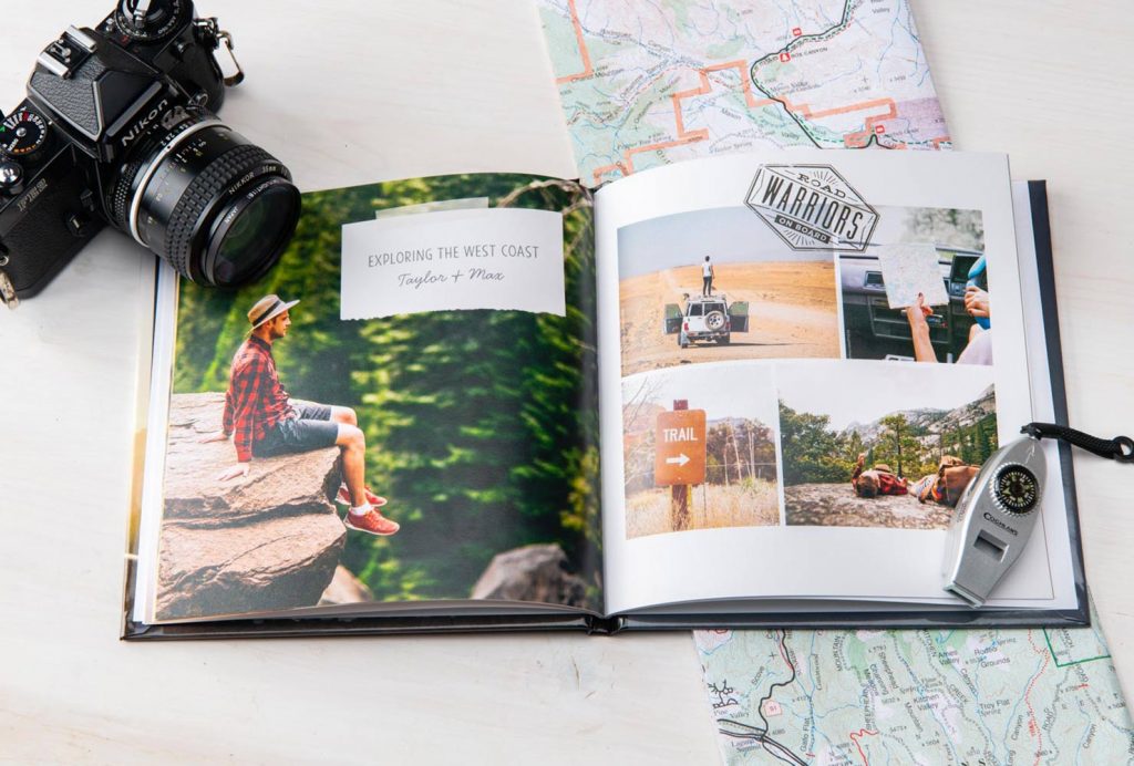 Travel photo book used as guest book featuring a NIkon camera and map