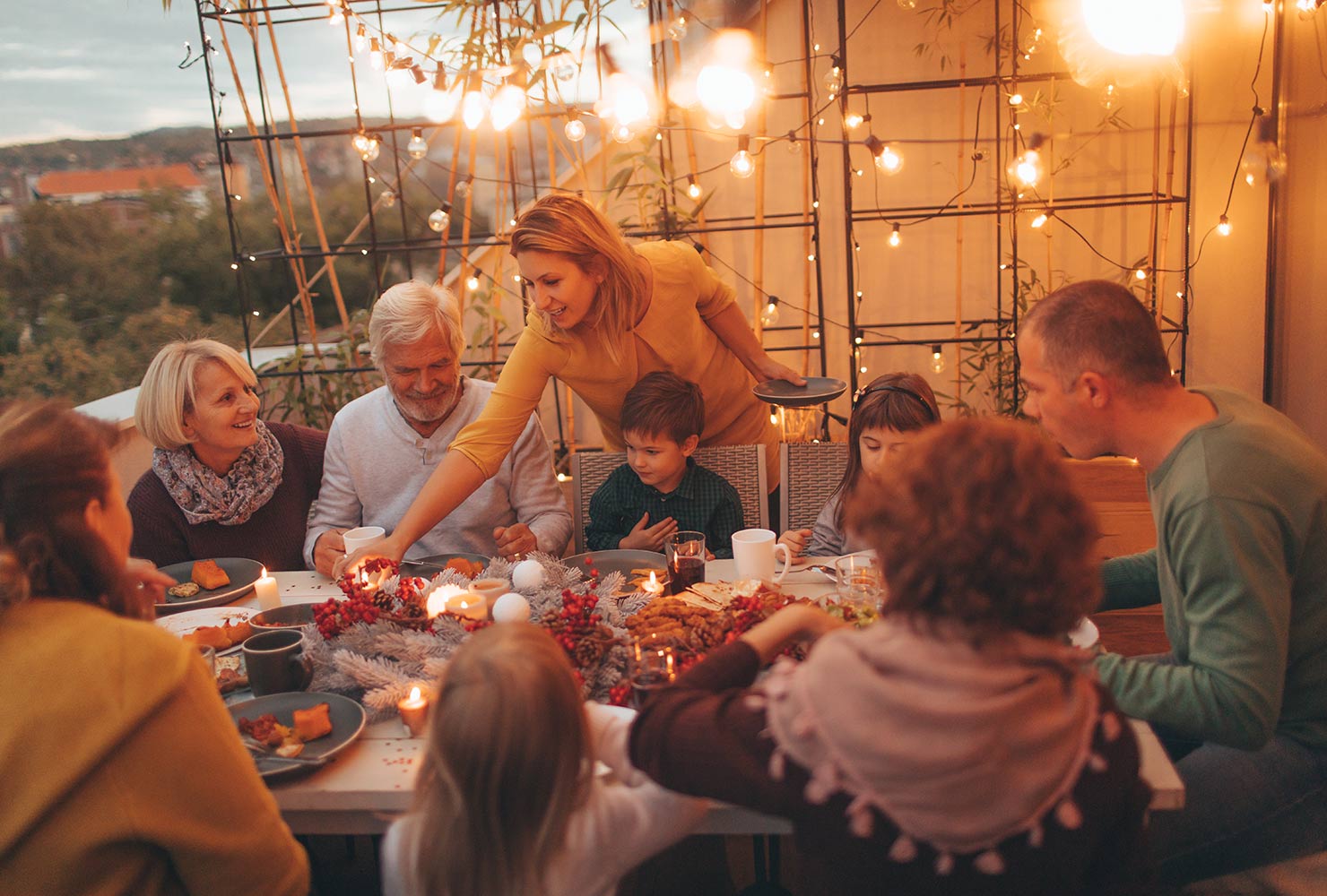 Family gathering at dinner outside.