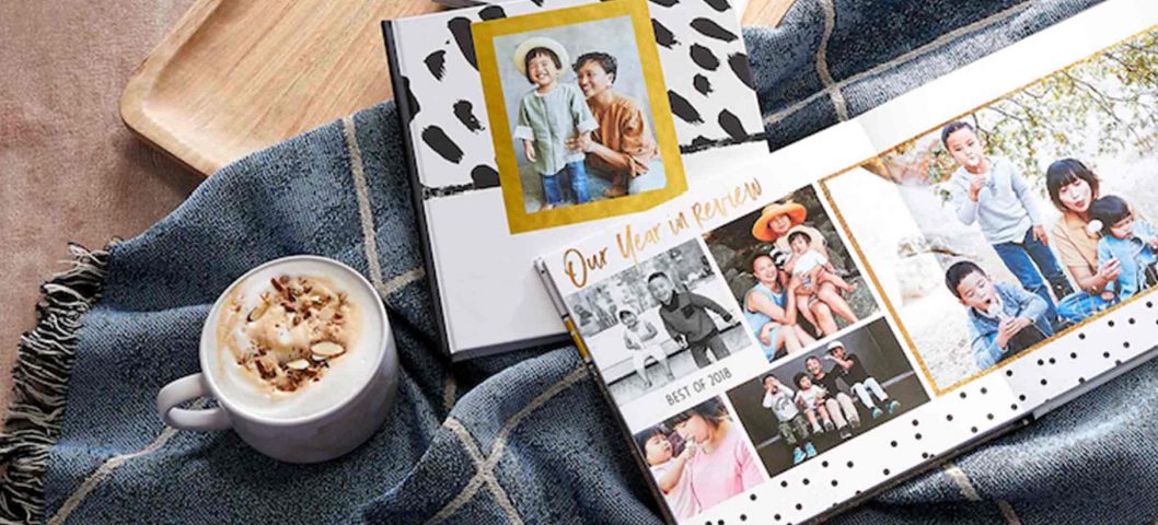 Photo books on throw blanket.