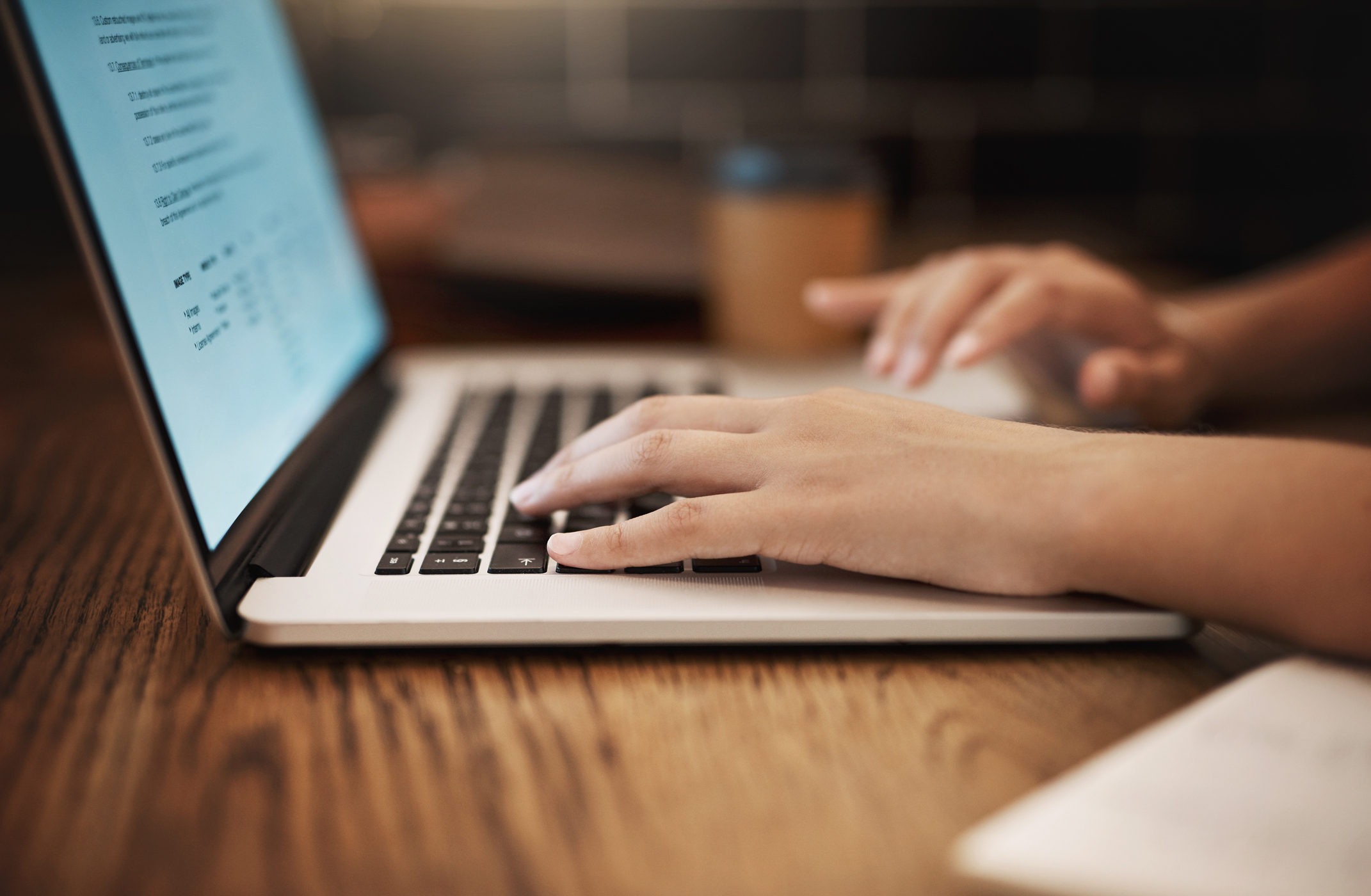 young student using her laptop to study 