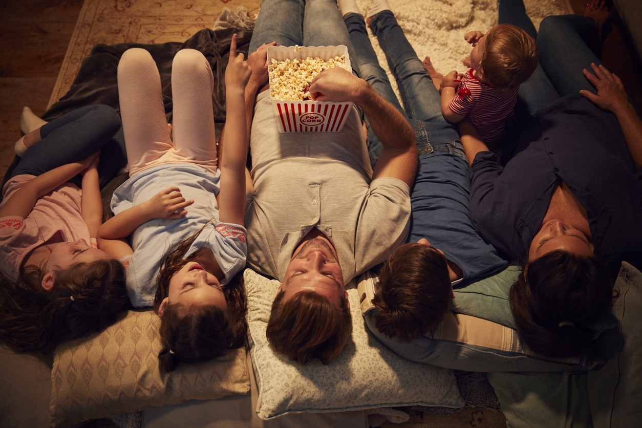 family having a movie night outside