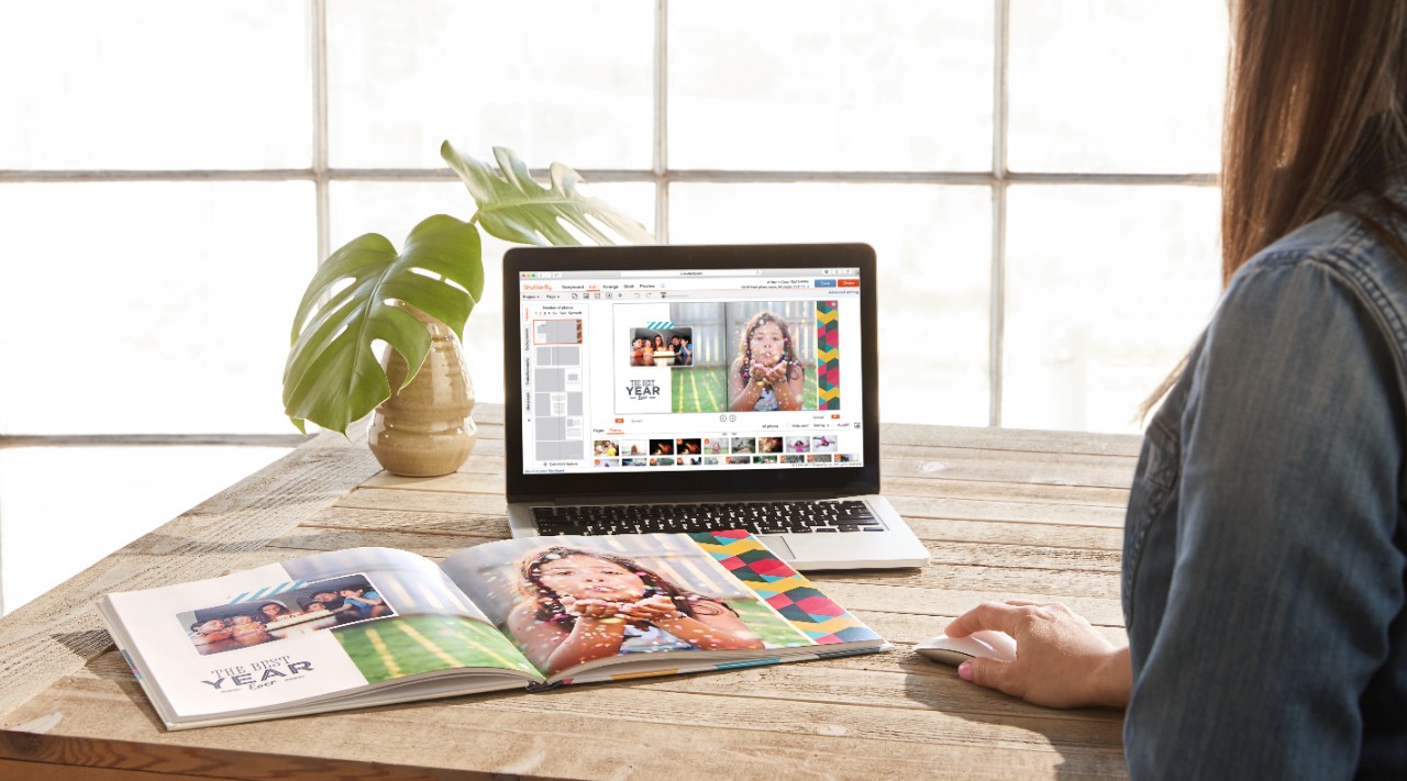organizing photo on a computer and creating a photo book