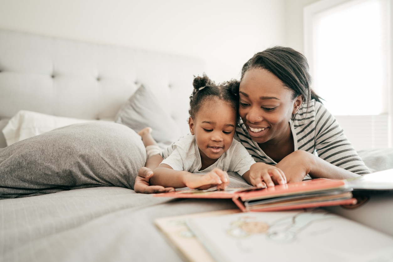 mom reading with daughter