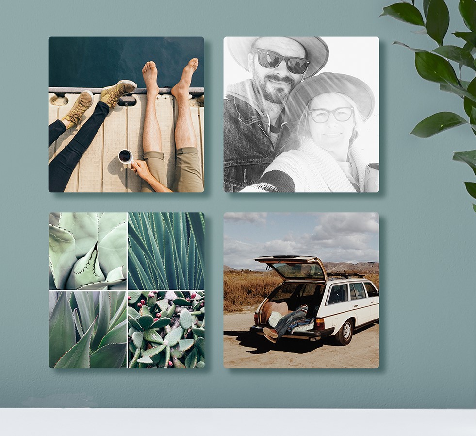 Photo tiles lined up 2X2 on a wall with different pictures and themes