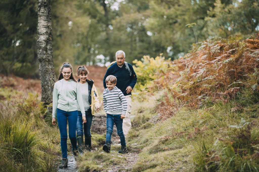 Staycation in nature with family taking a hike together