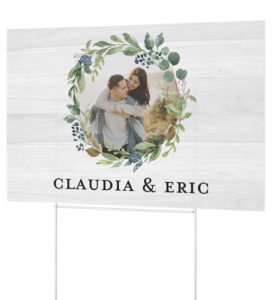 rustic foliage yard sign with happy couple on the front