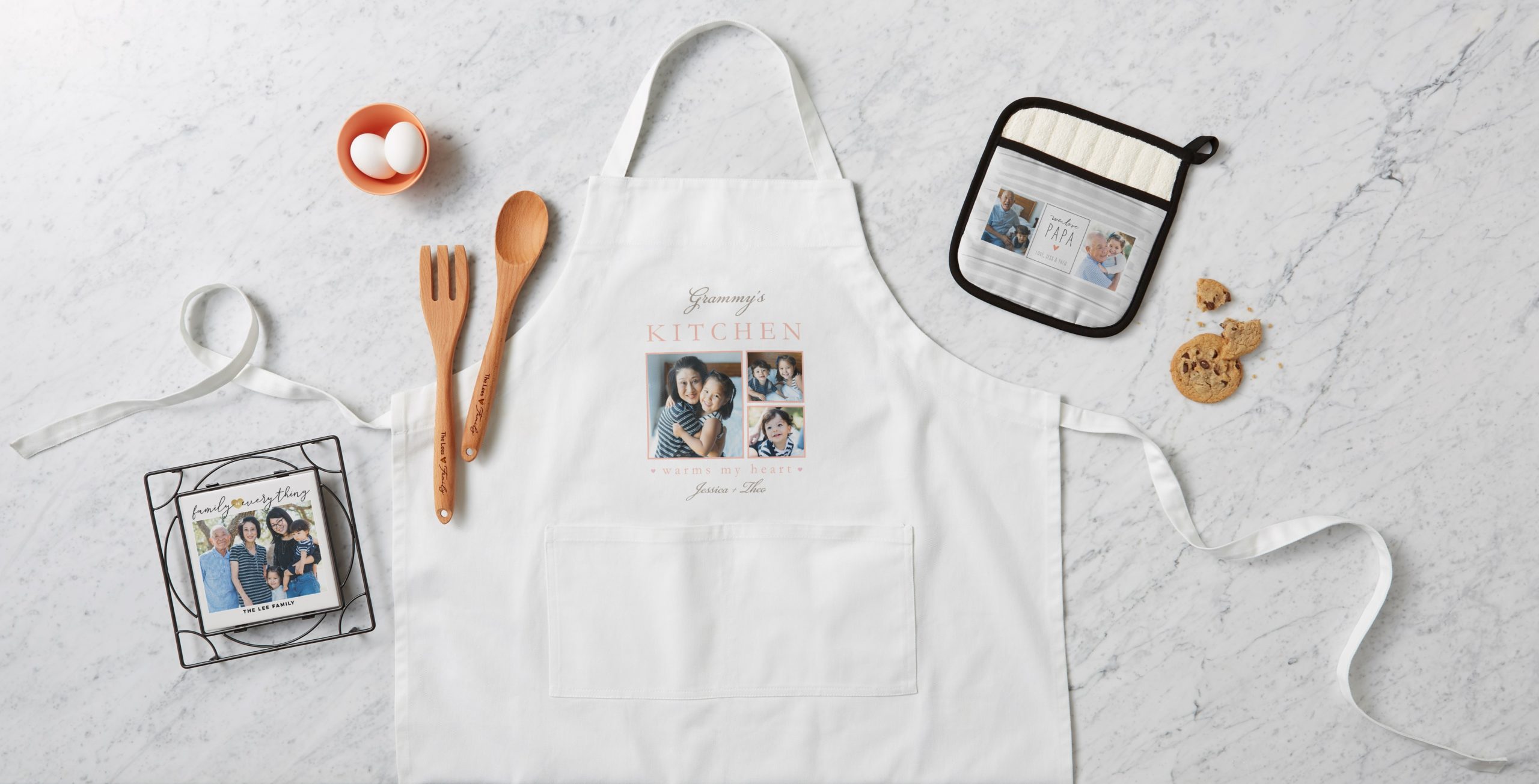 Personalized kitchen accessories with apron, oven mits, and trivet
