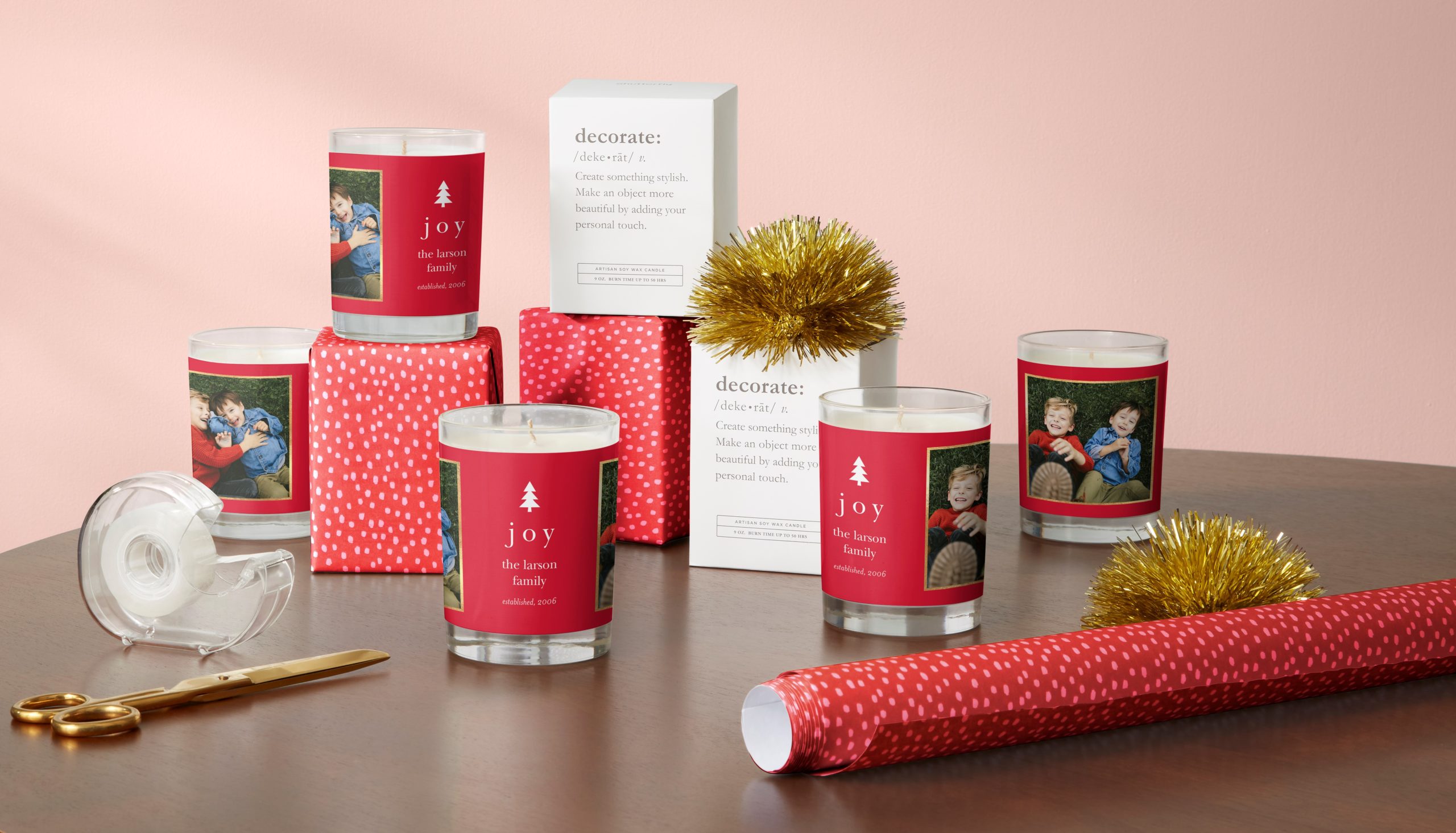 red holiday candles with joy family photos for the holiday season