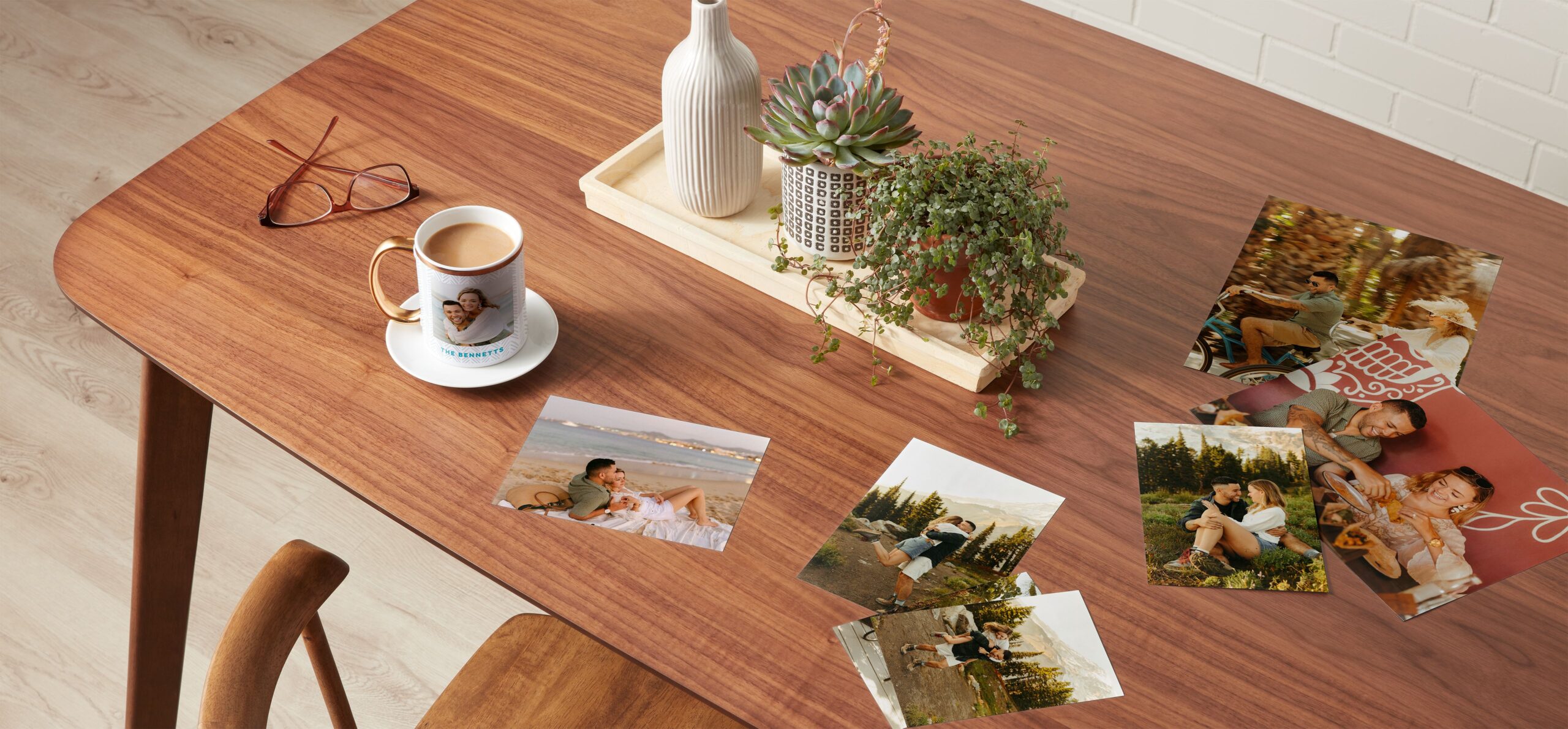 a collection of photo prints displayed on a table