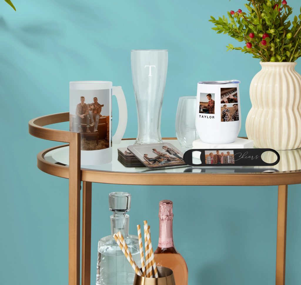 Collection of custom barware like beer glasses and bottle openers