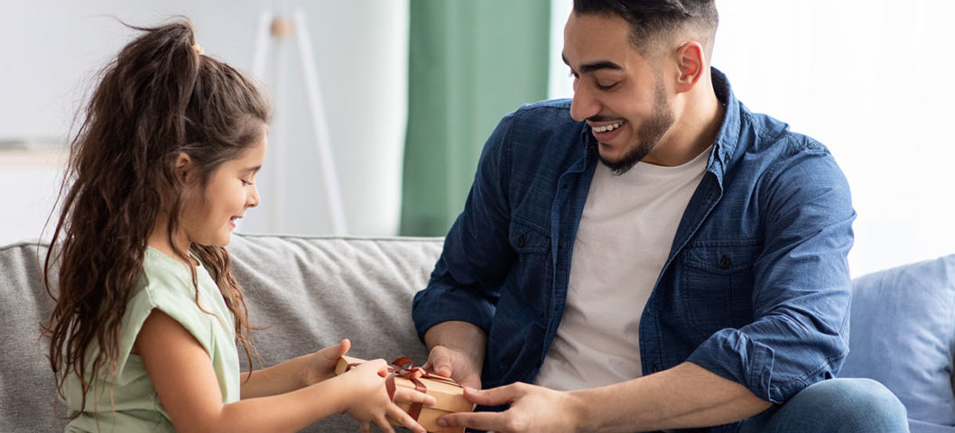 Daughter-giving-her-father-a-DIY-Fathers-Day-gift