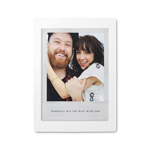 picture of a couple on a photo magnet