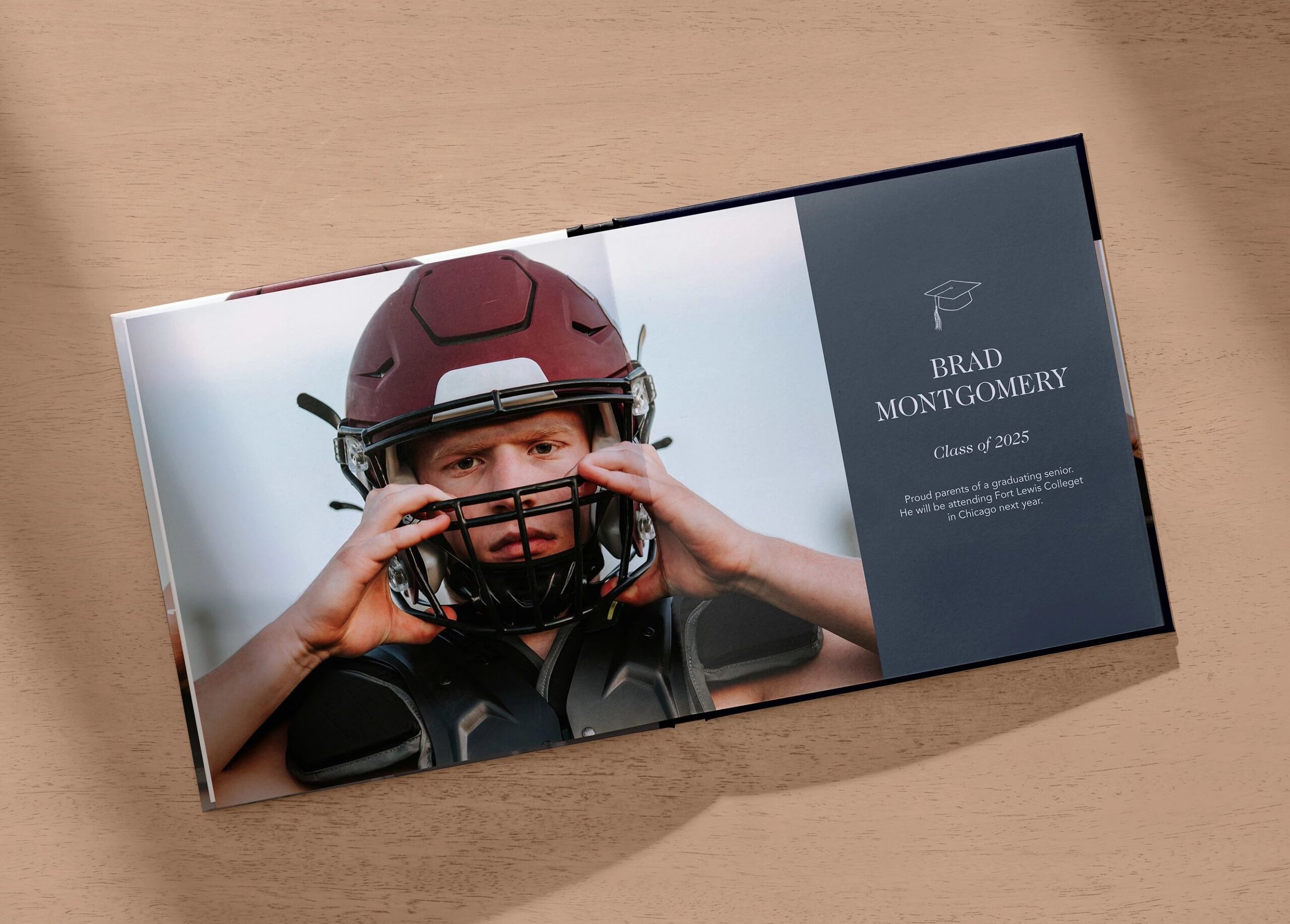 graduation photo book with photo of high school football player