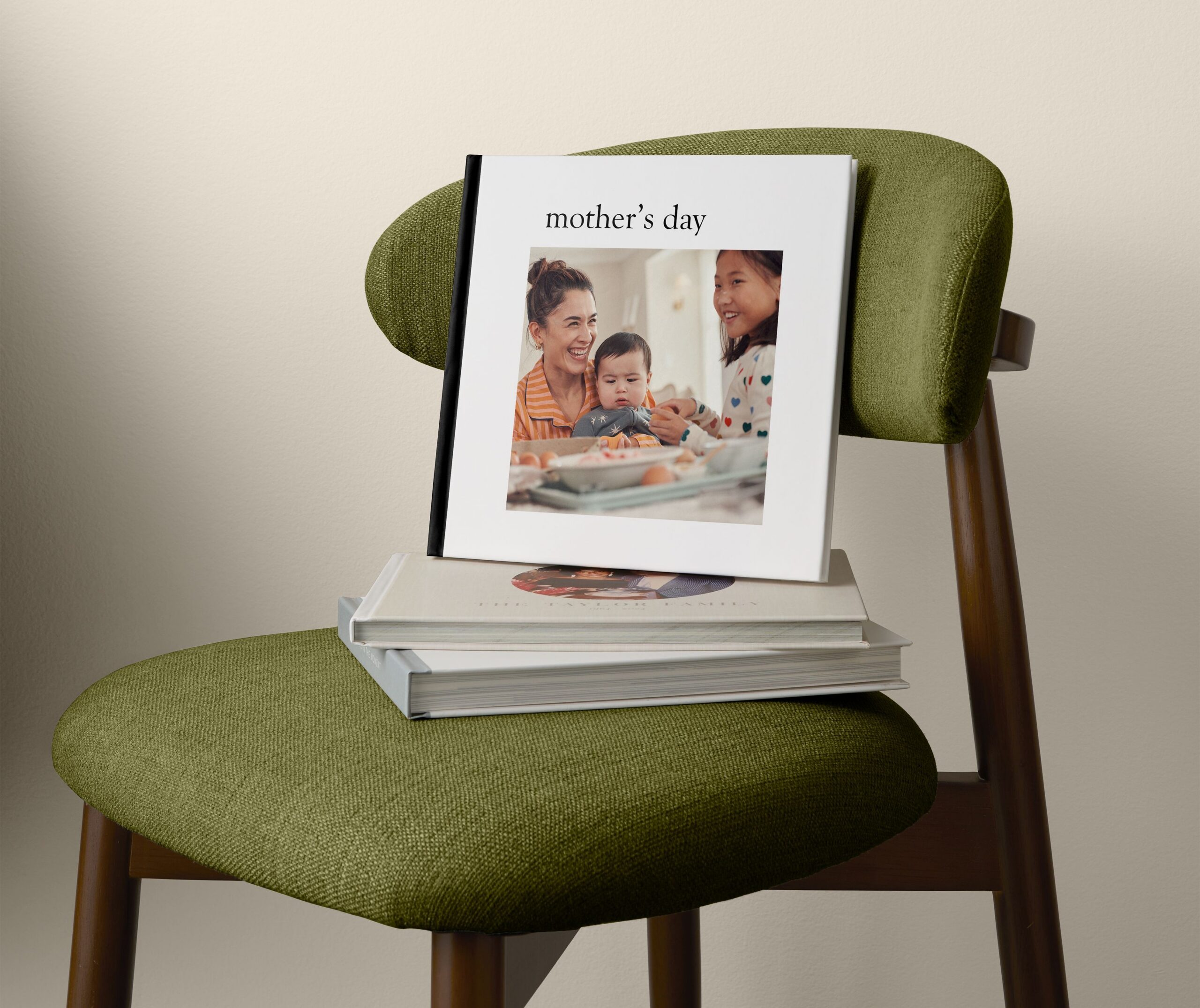 mother's day photo book on a green chair