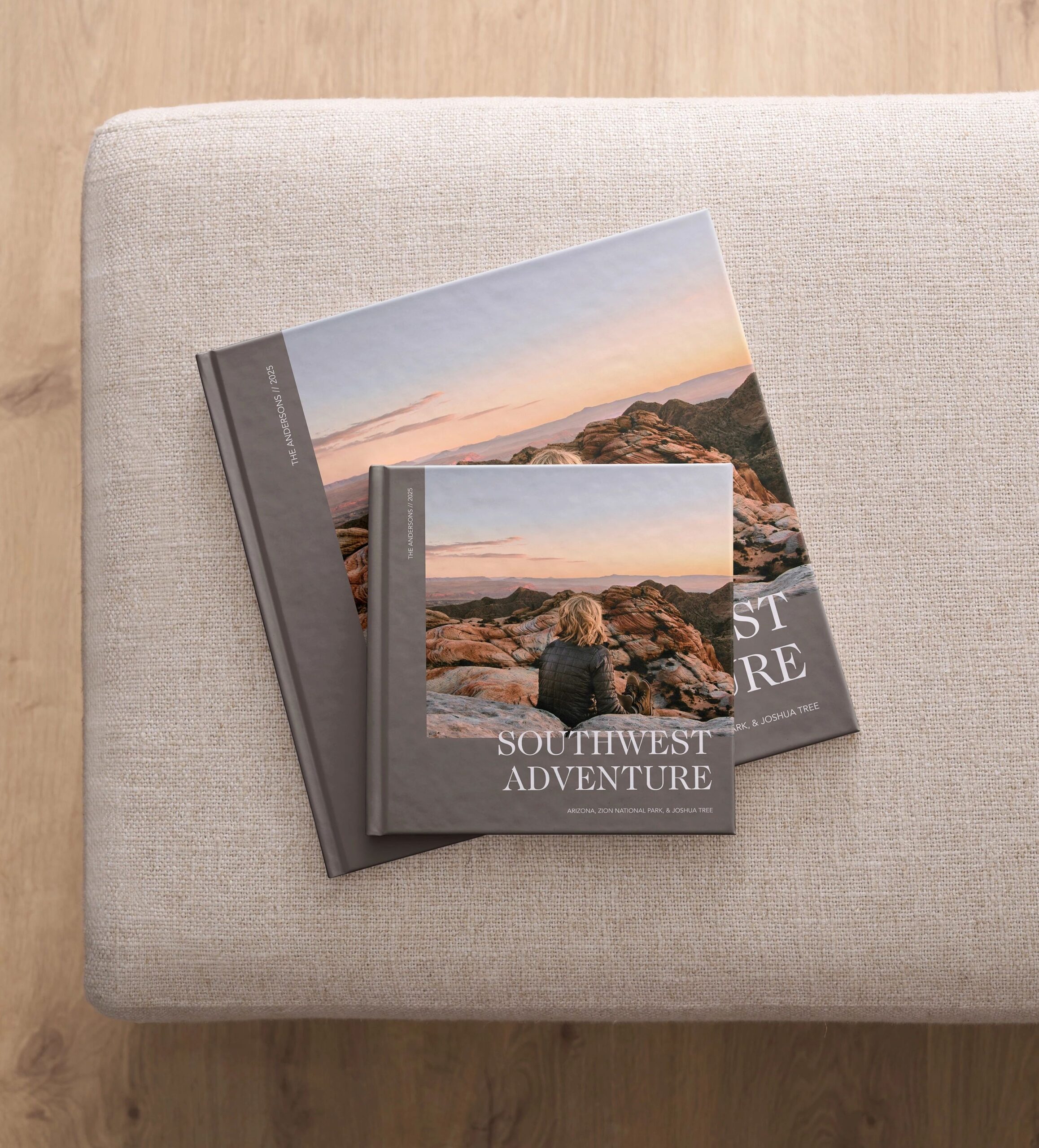 two different sized travel photo books