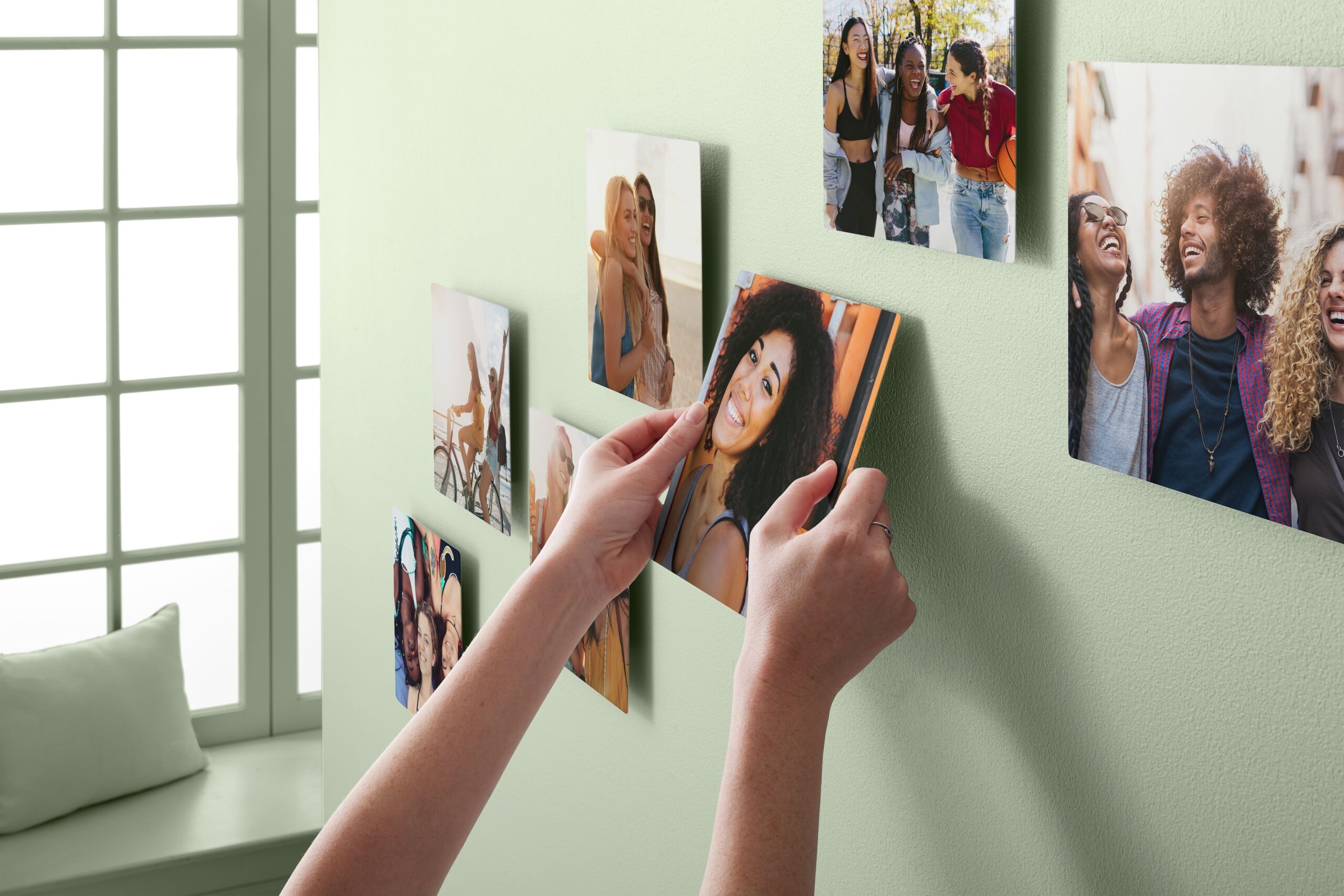 hanging stickable photo tiles on the wall