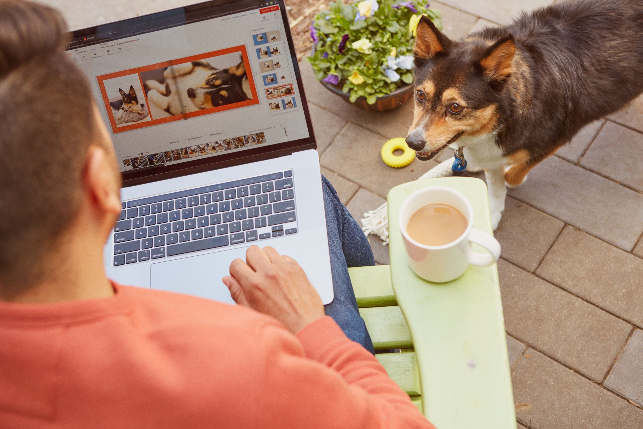 man making a photo book online on the shutterfly website