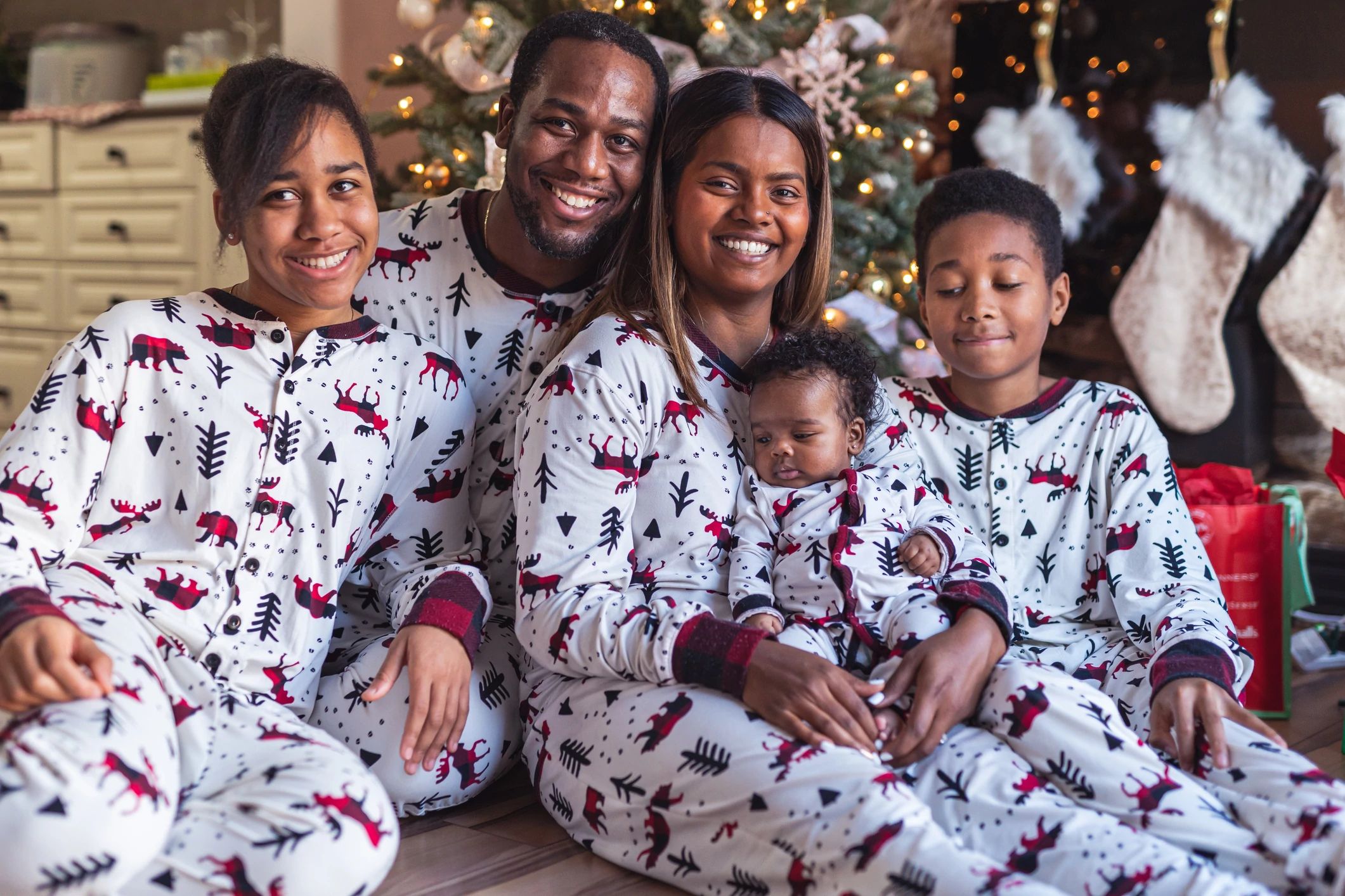 family wearing matching christmas pajamas