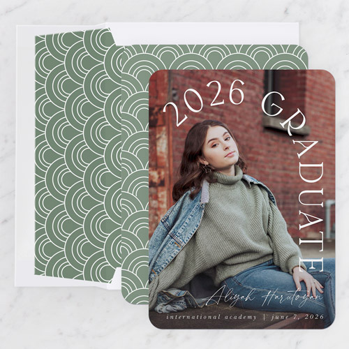 girl sitting down posing for photo on graduation announcement