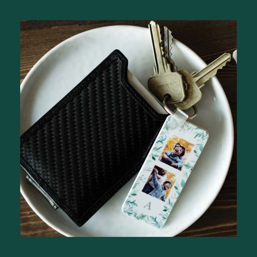 photo keychain next to a wallet