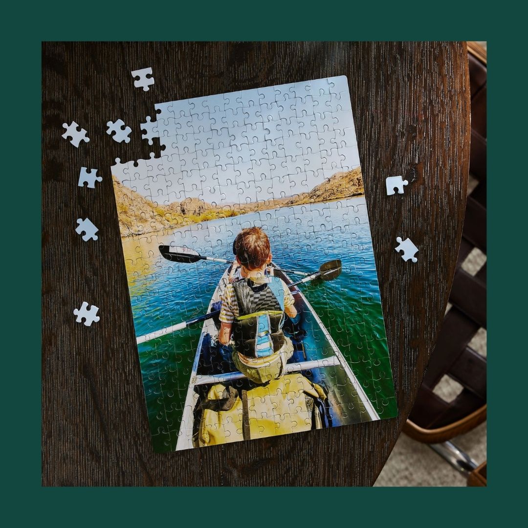 photo puzzle with picture of child on kayak