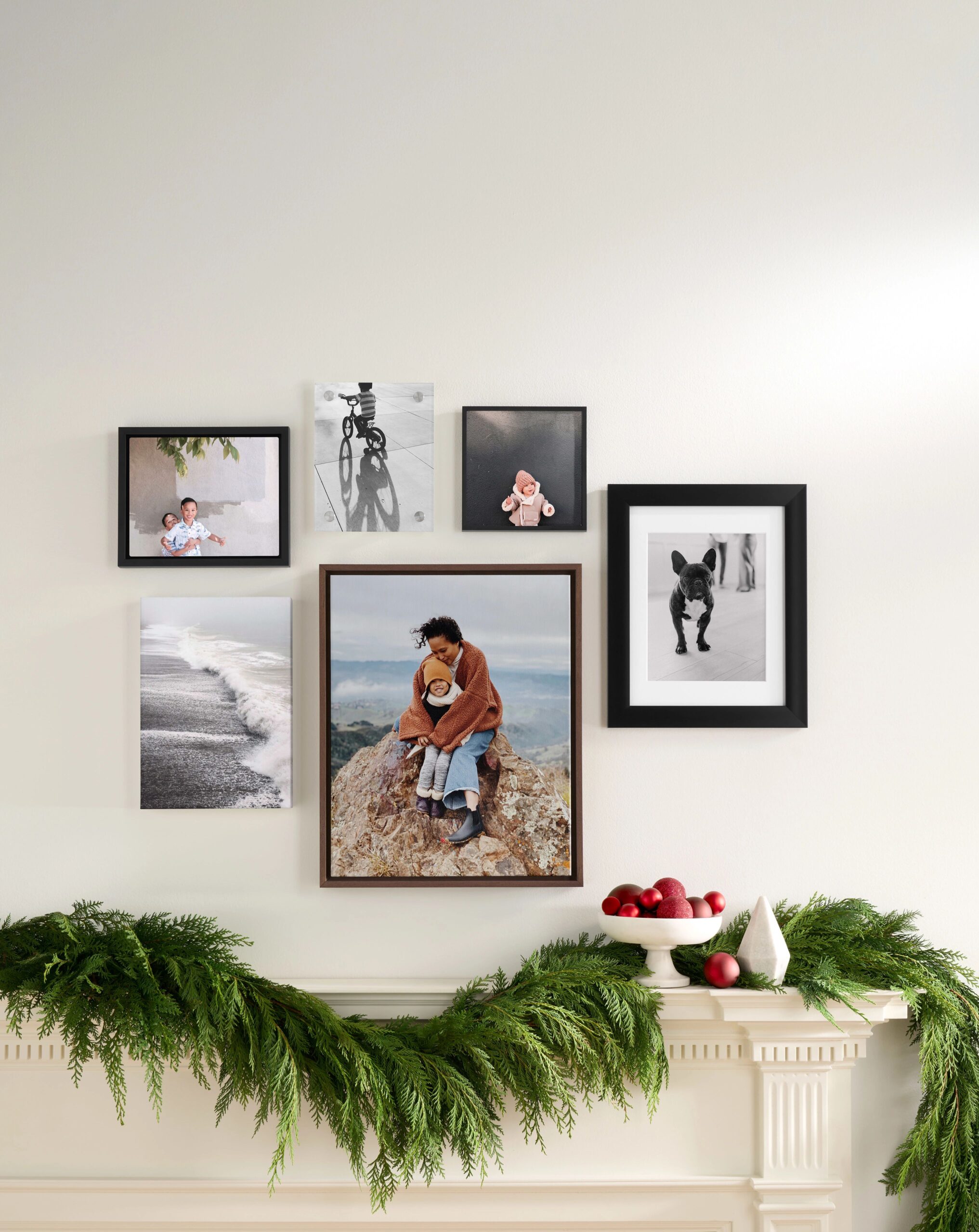 garland under a photo wall art display