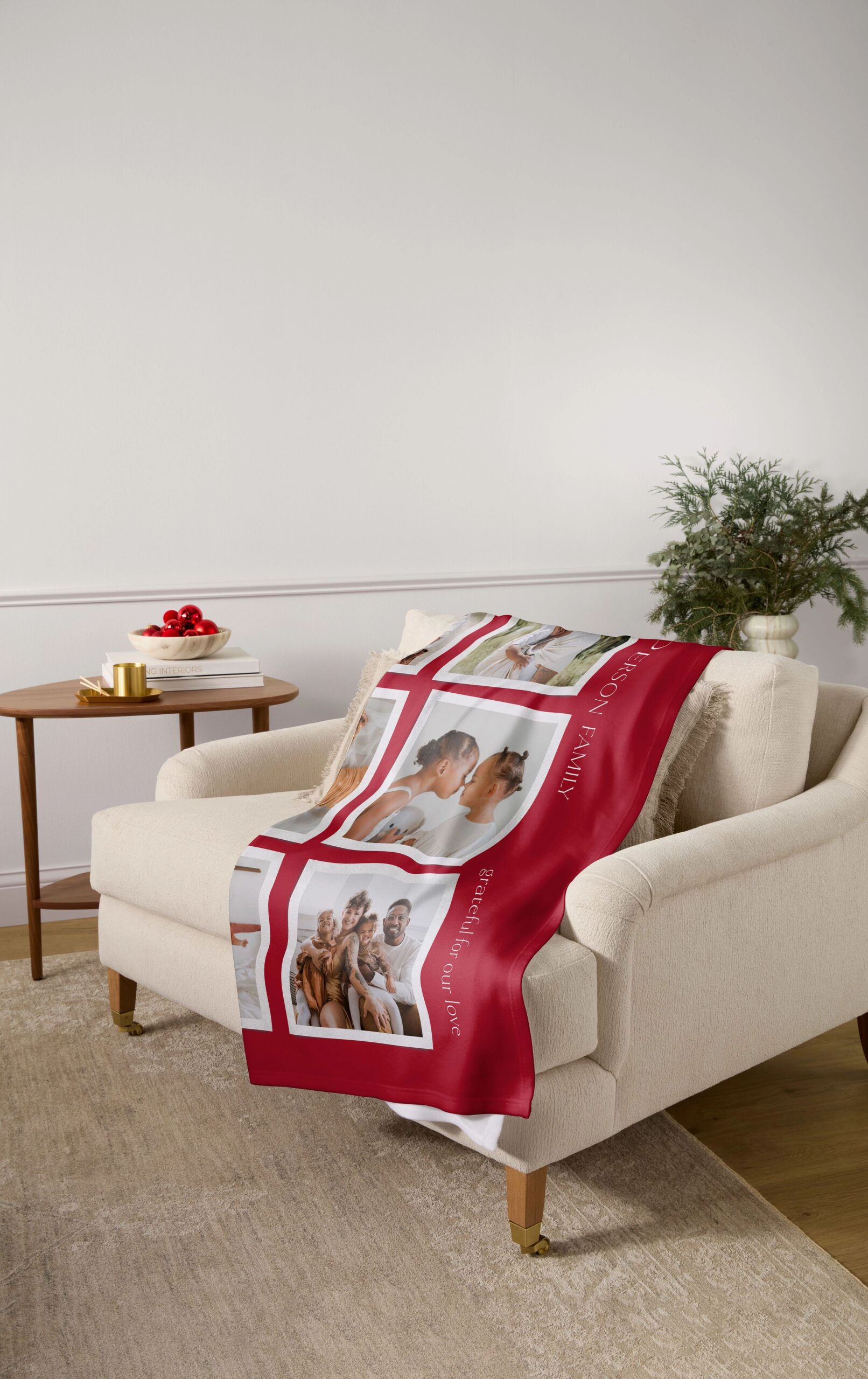 red photo blanket displayed on couch