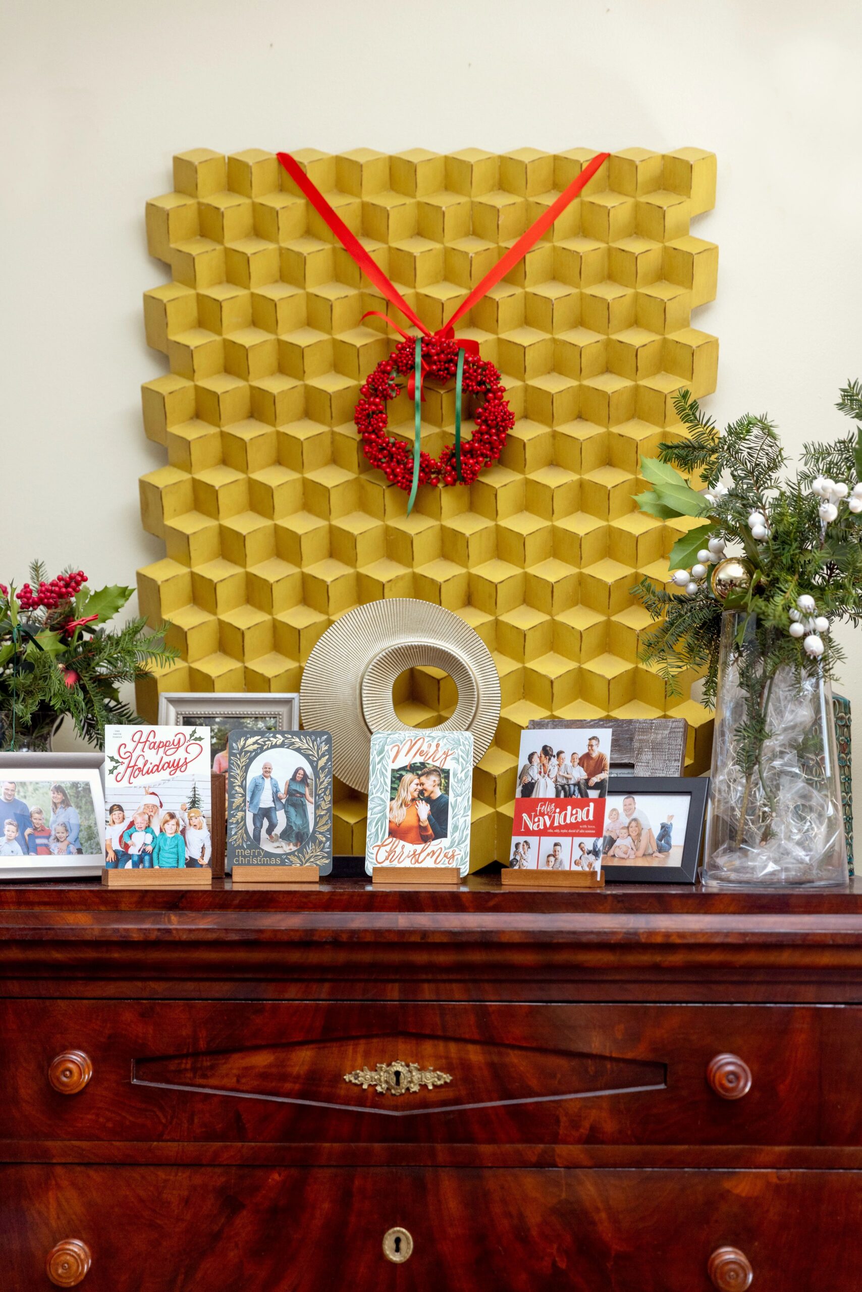 christmas cards displayed on a mantle