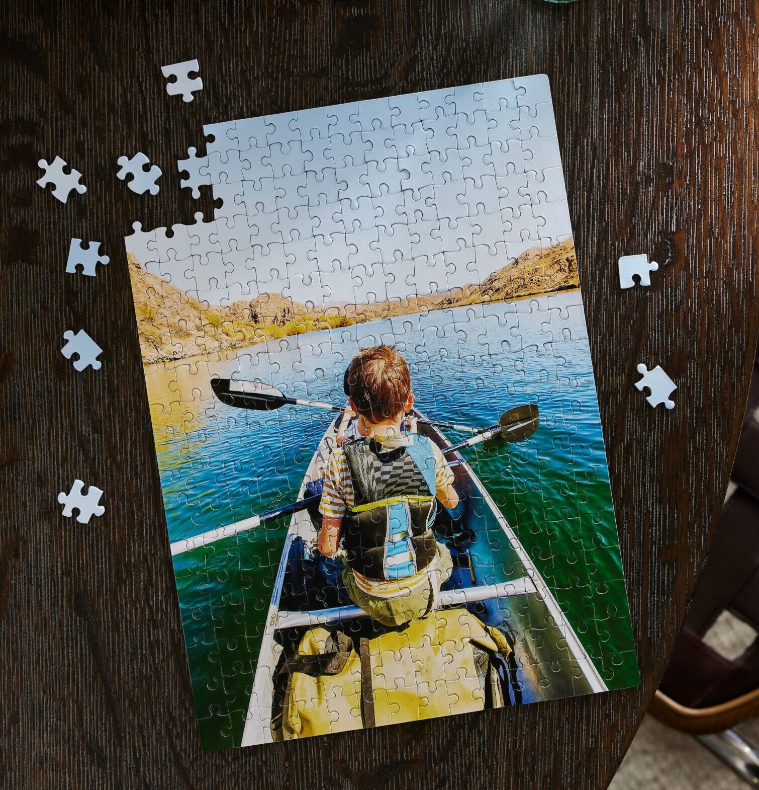 photo puzzle with picture of boy kayaking