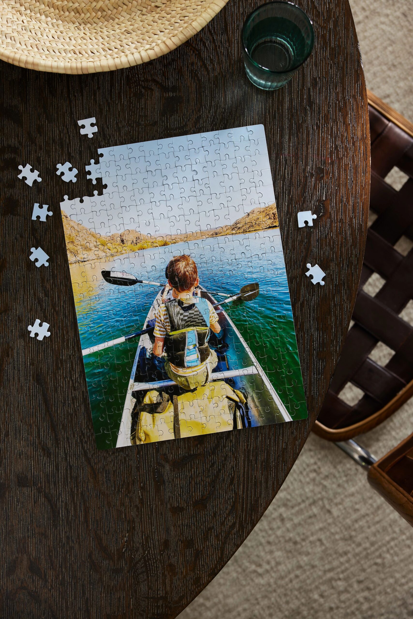 photo puzzle with image of child kayaking