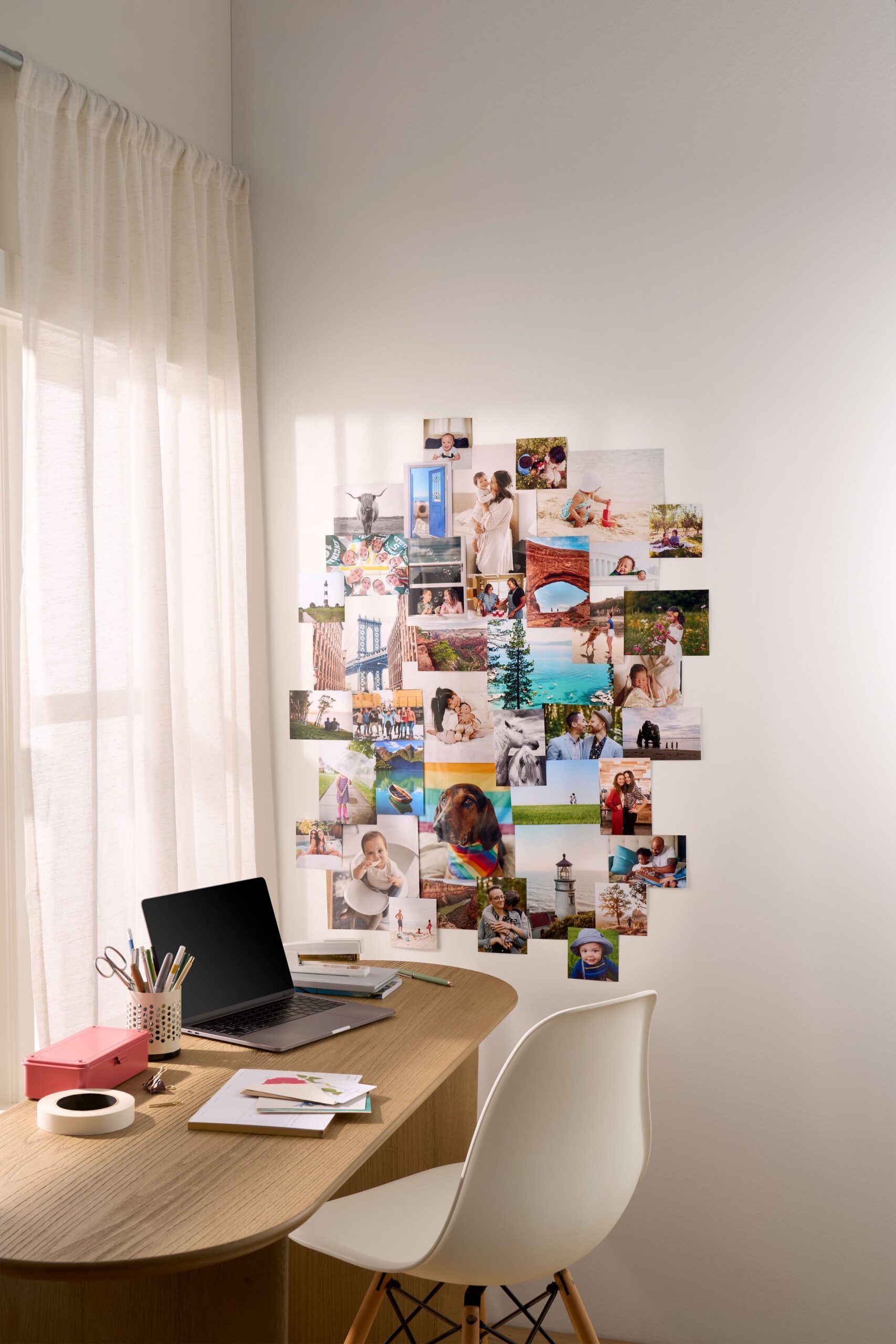 photo prints in a collage on the wall