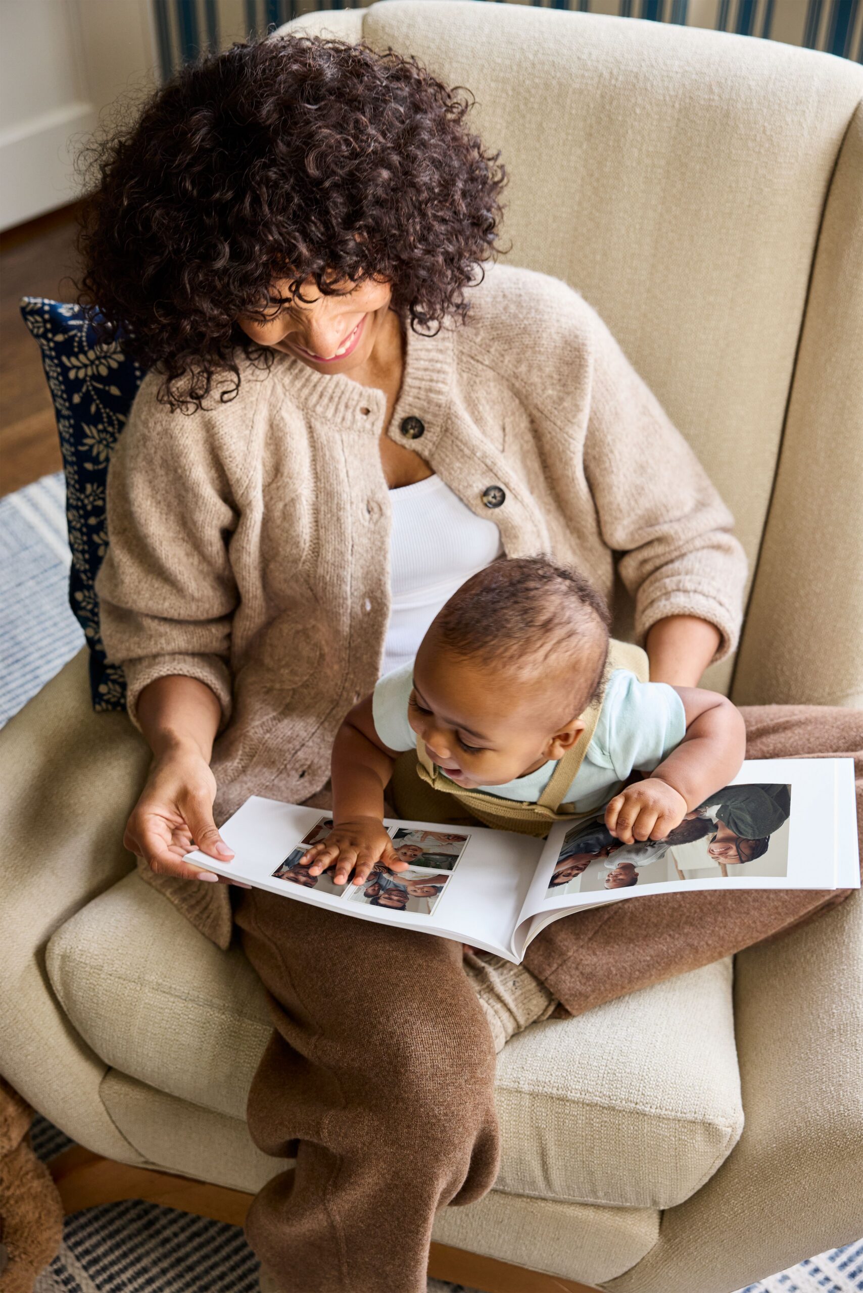 grandma and baby looking at photo book