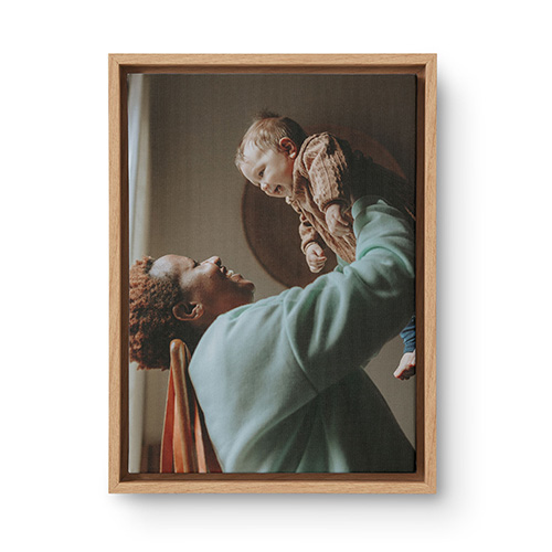 photo of grandma holding baby on canvas print
