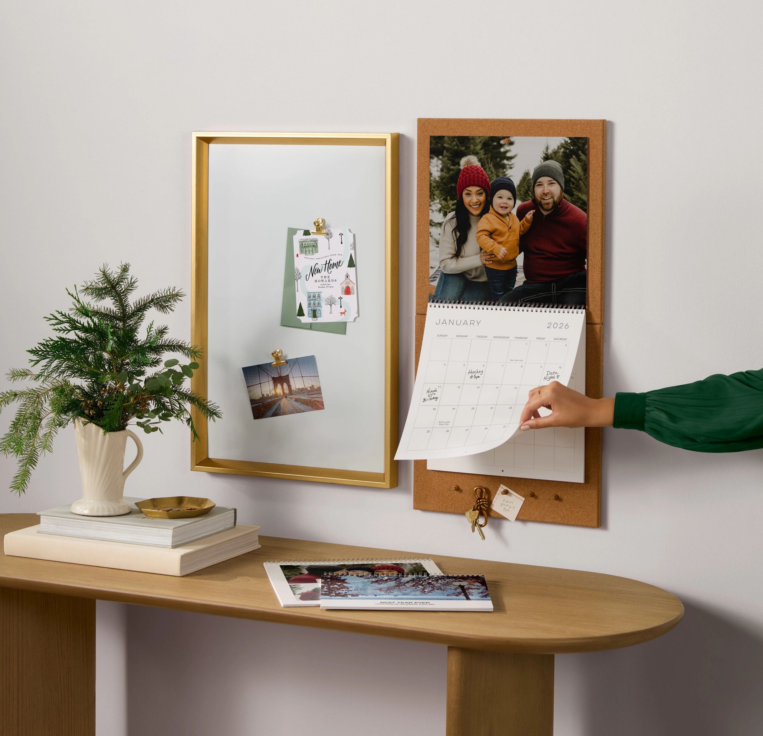 photo wall calendar hanging above table