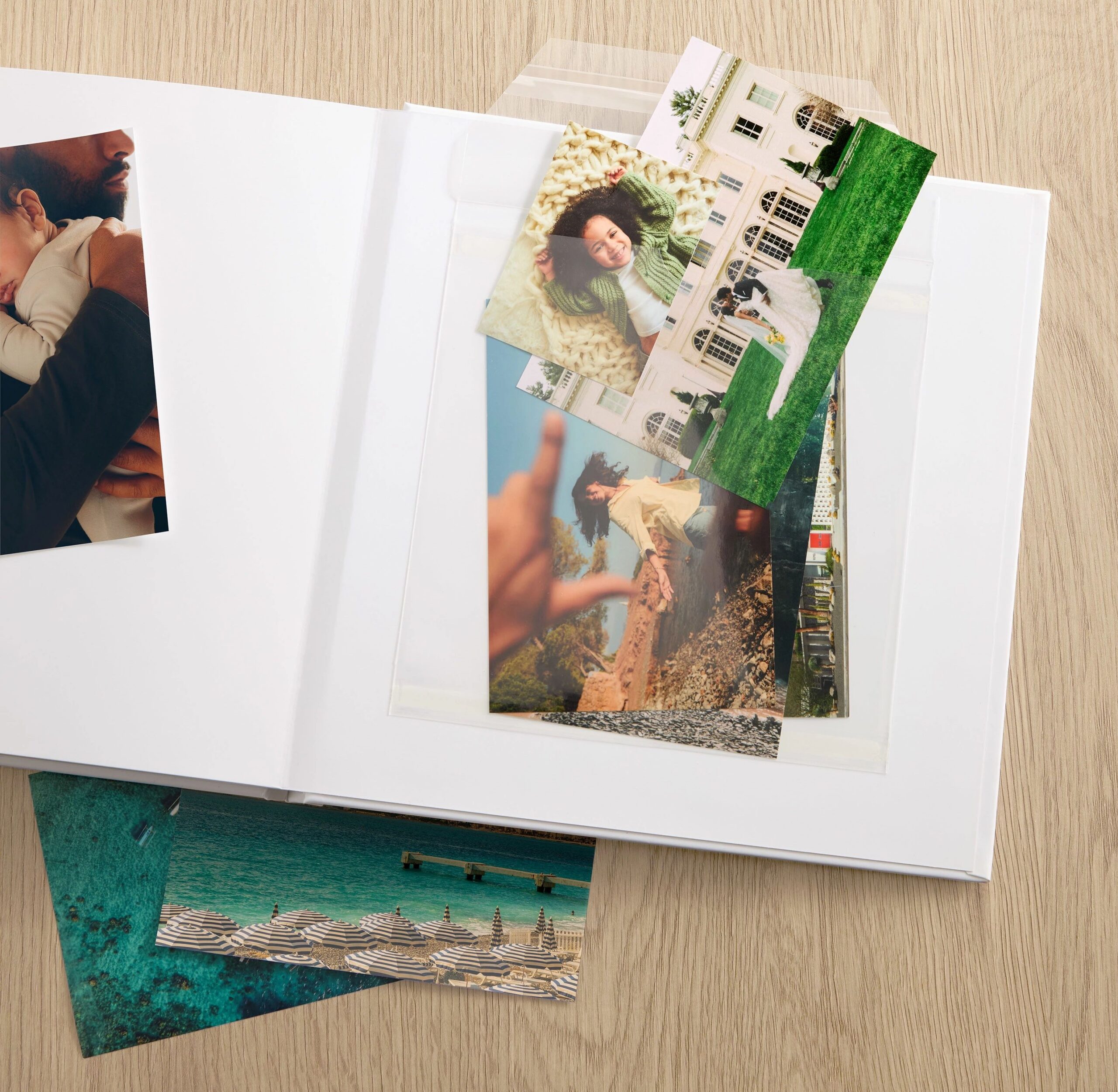 photo prints in a memorabilia pocket in a photo book