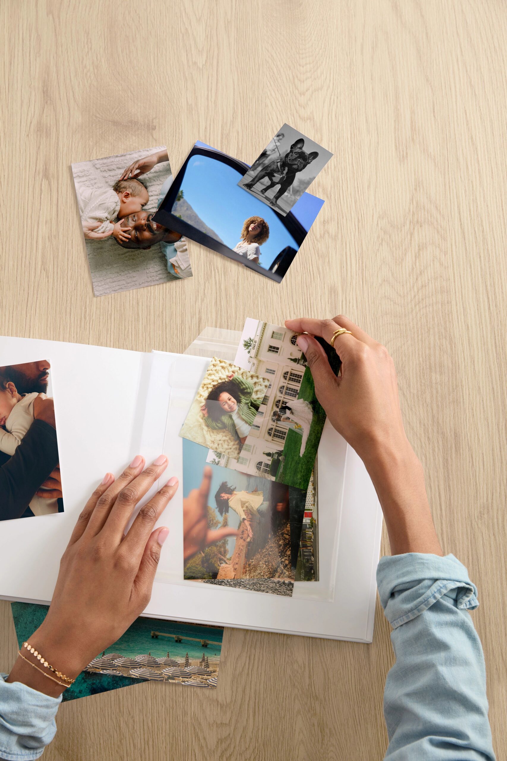 photo prints inserted into a memorabilia pocket in a photo book