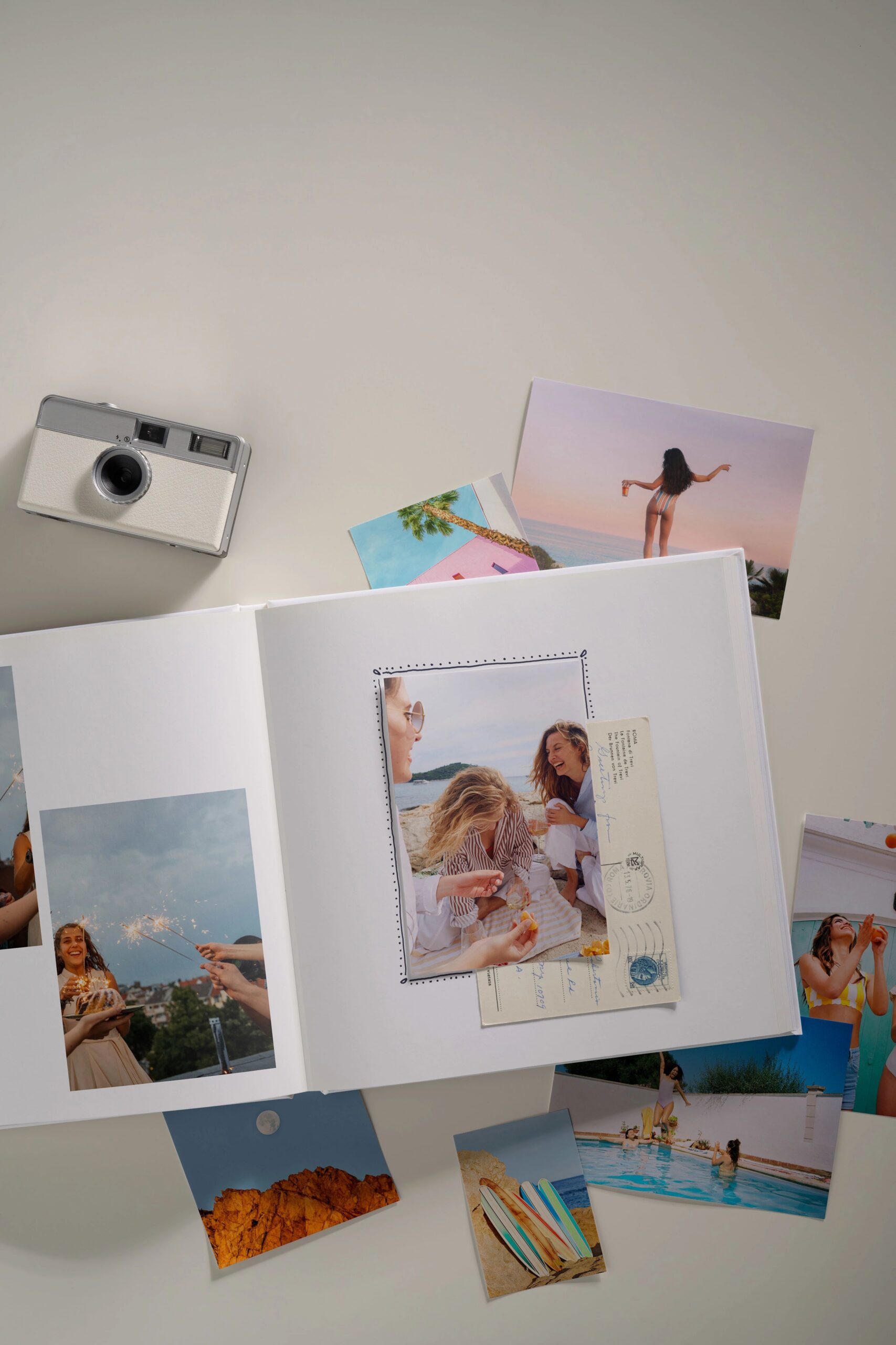 photo prints taped into a photo book