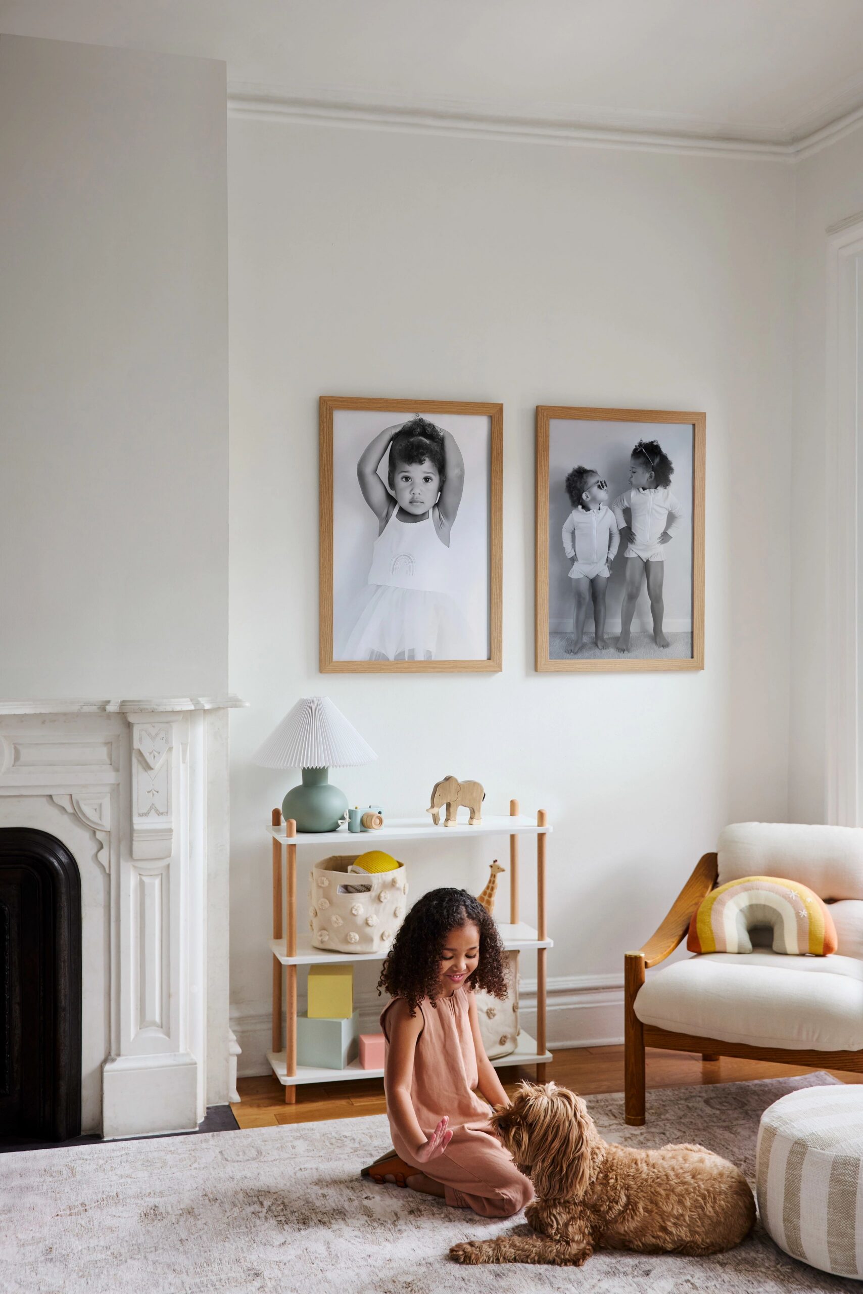 large framed prints with natural frame in child's room 