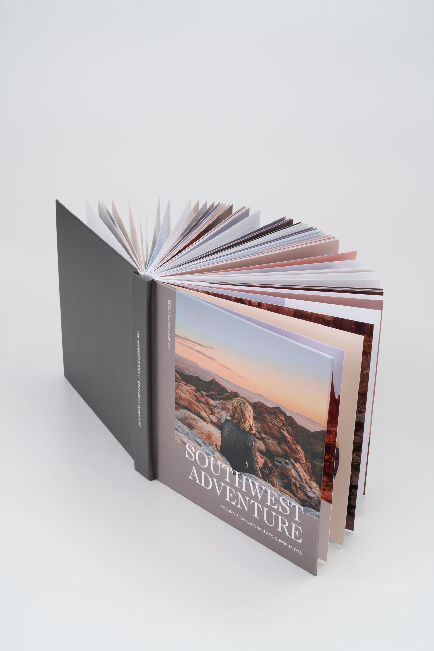 open photo book with pages fanned open