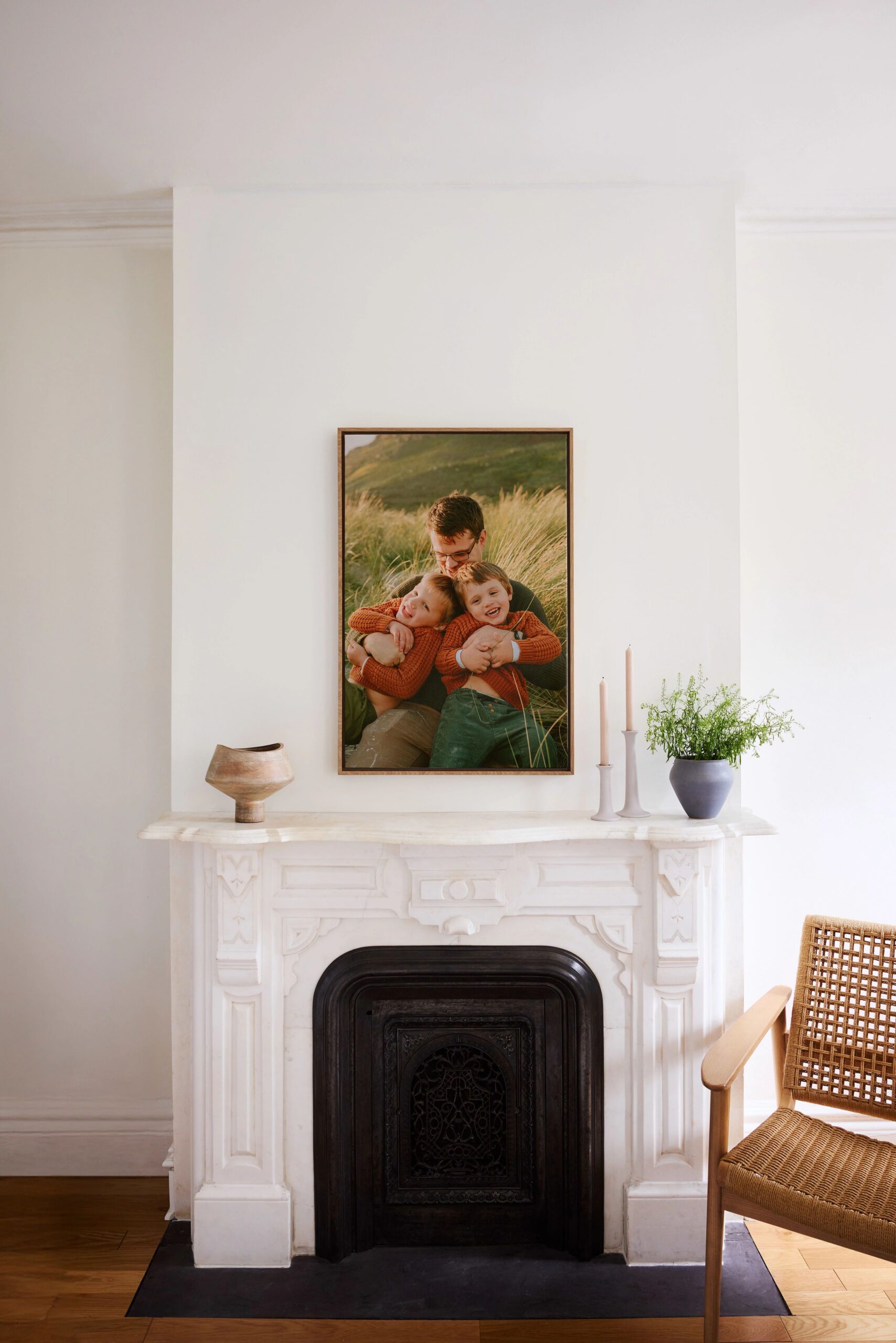 one canvas print above fireplace