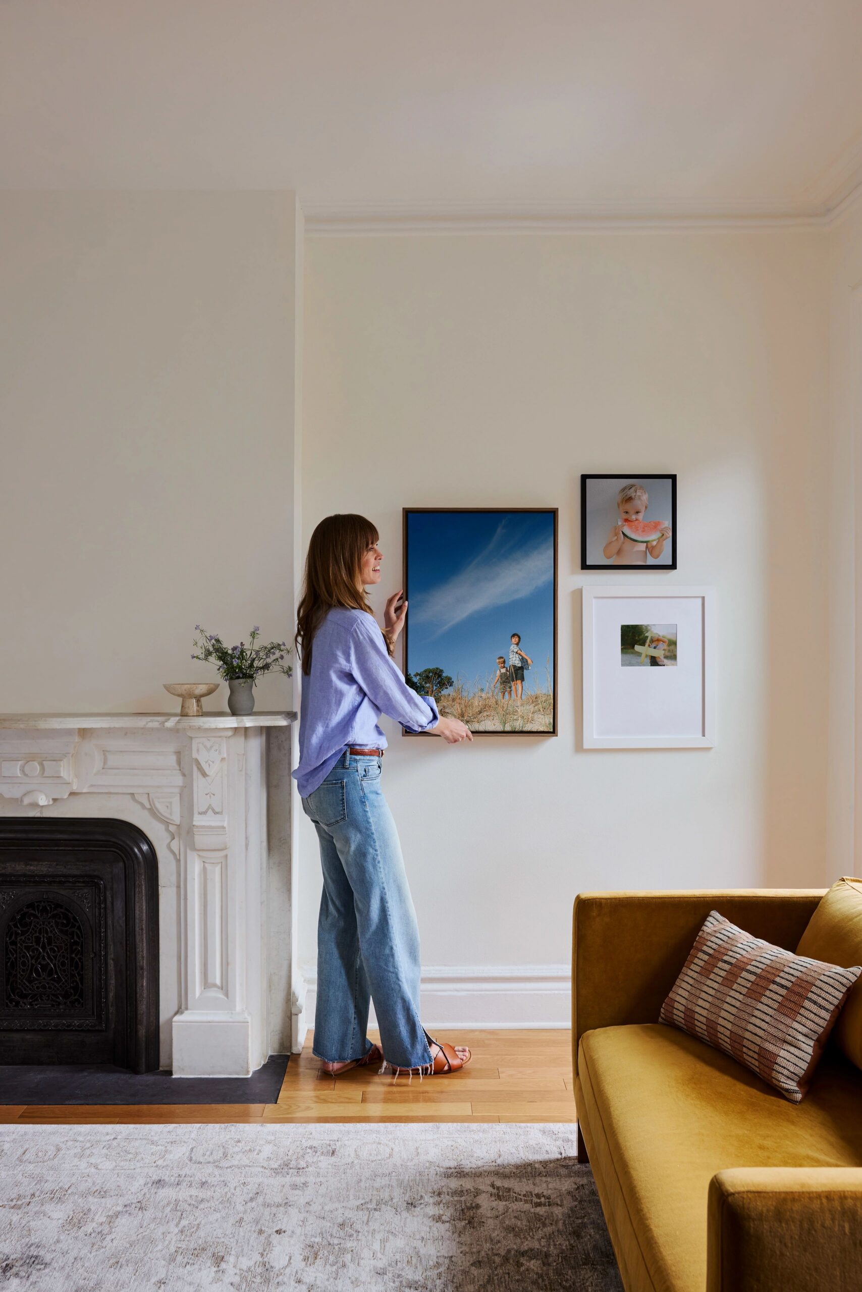woman hanging wall art