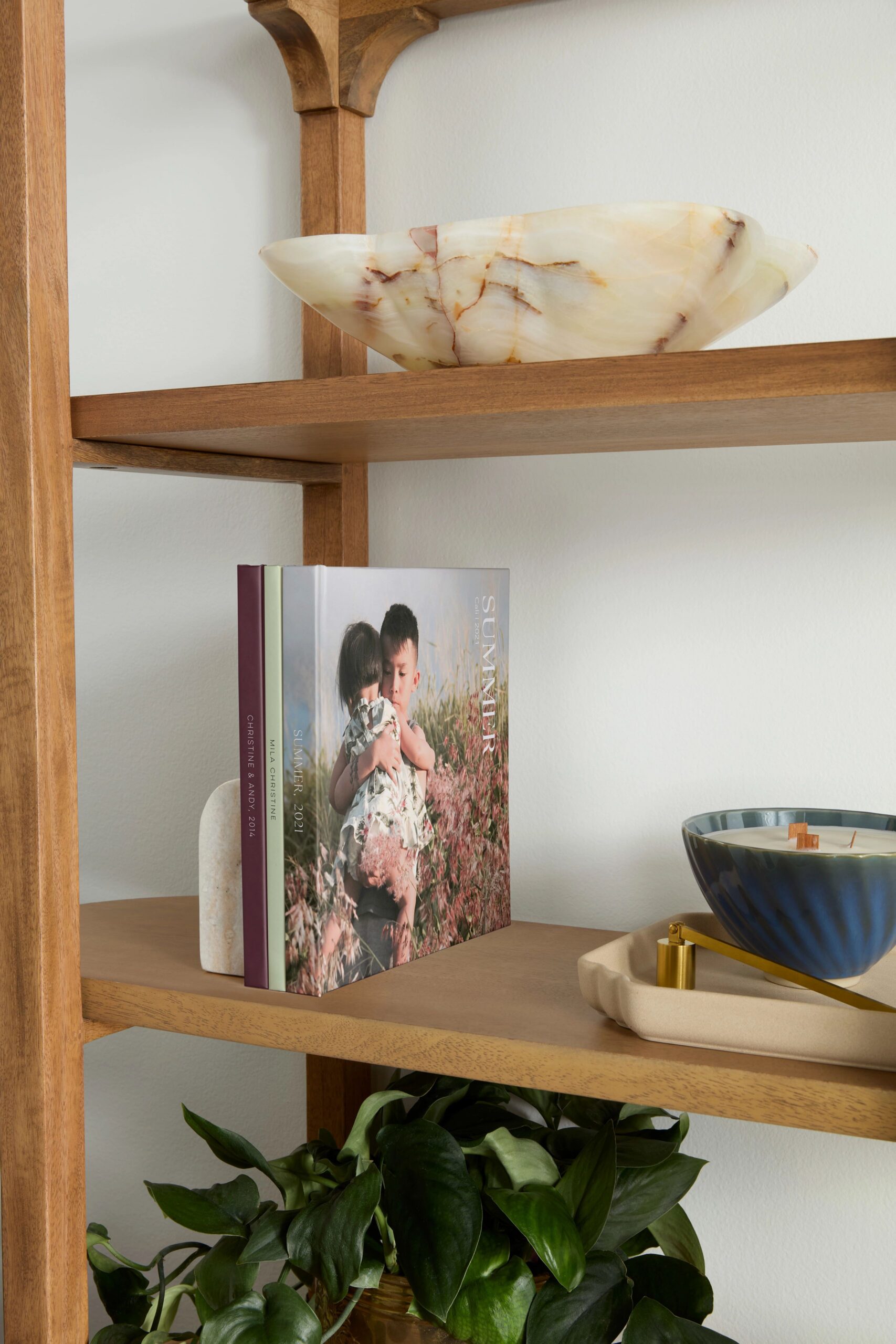 photo-wrapped photo book on a shelf