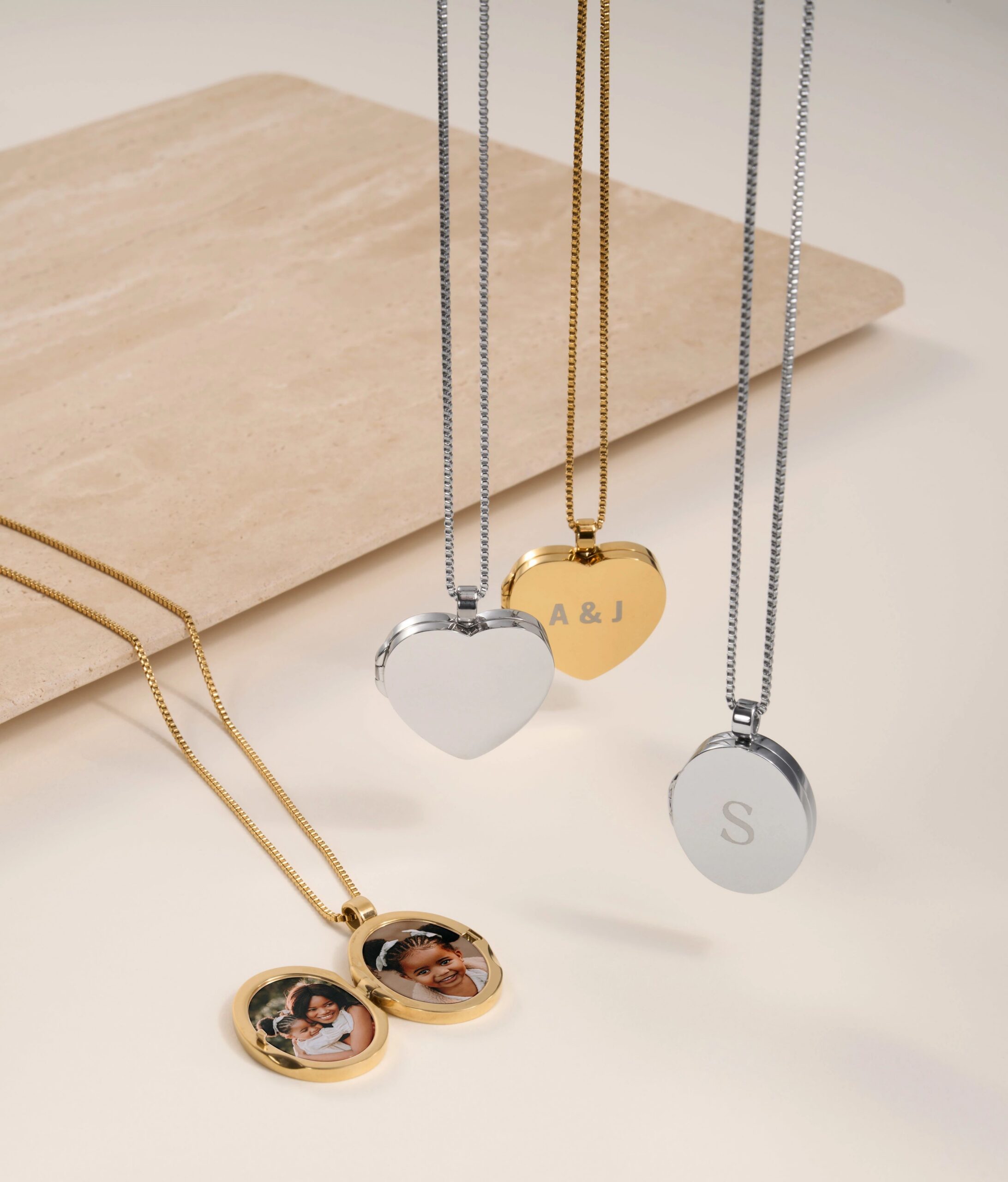 gold and silver photo lcokets